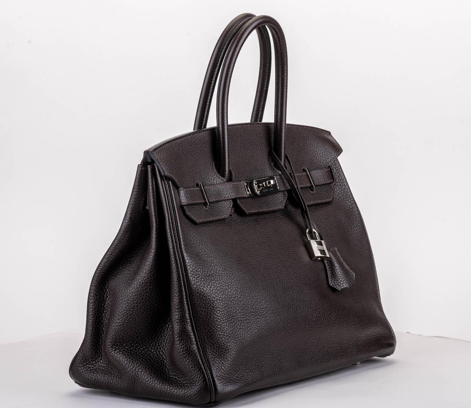 Hermès Birkin 35 cm ebene clemence leather and palladium hardware. Comes with clochette, tierce, lock, 2 keys, non original dust cover. Date stamp R for 2014. Handle drop 4