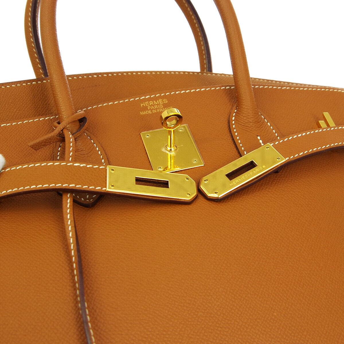 Hermes Birkin 35 Cognac Leather Gold Top Handle Satchel Travel Tote Bag in Box

Leather
Gold tone hardware
Leather lining
Date code present
Made in France
Handle drop 4