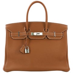 Hermes Birkin 35, crafted in Gold brown Togo leather Hermes Birkin 35, crafted in Gold brown Togo leather