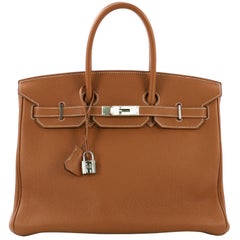 Hermes Birkin 35, crafted in Gold brown Togo leather Hermes Birkin 35, crafted in Gold brown Togo leather