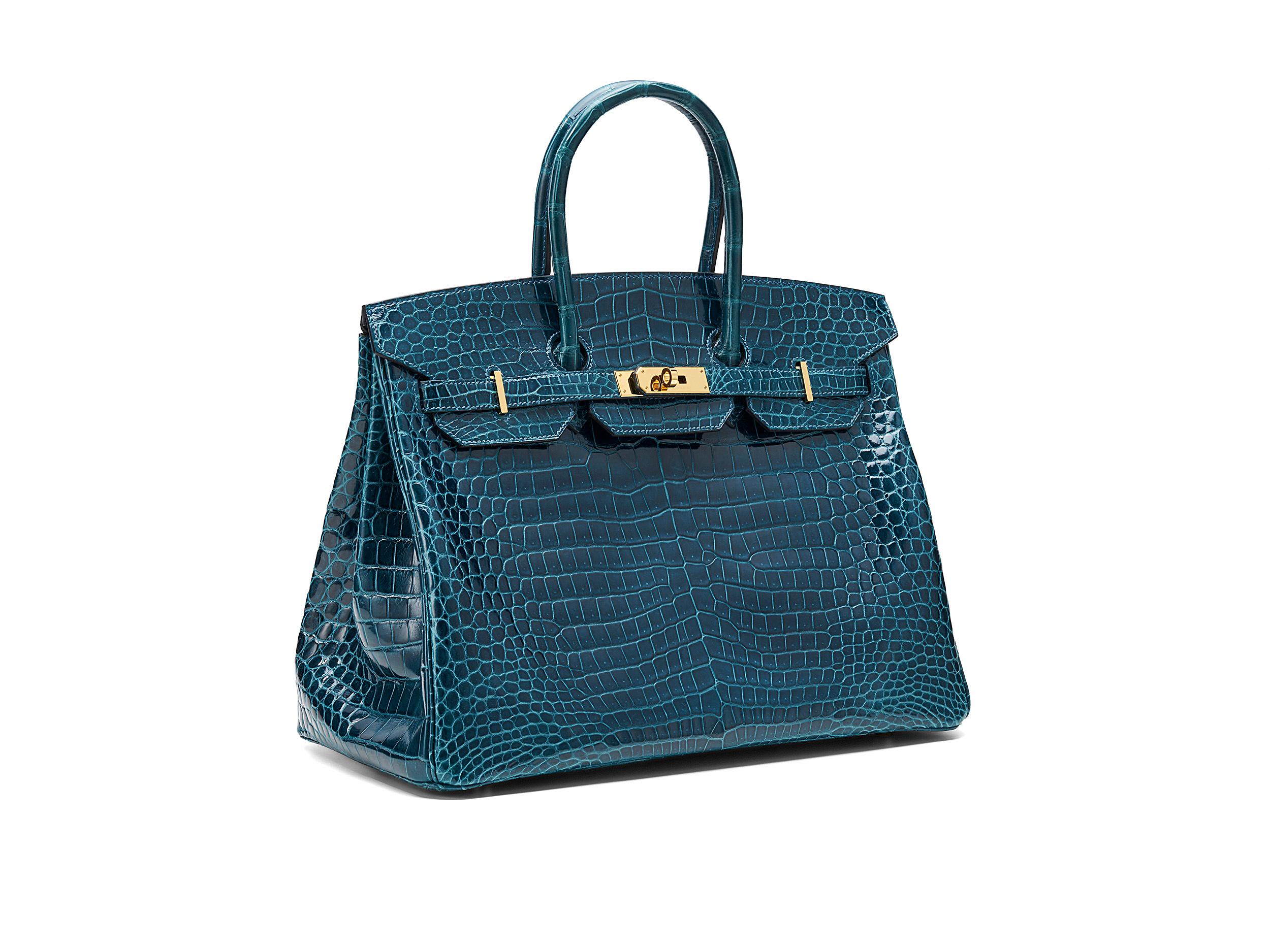 Hermès Birkin 35 in pelle di coccodrillo porosus colvert e lucida con finiture dorate. La borsa non è stata indossata ma presenta graffi minimi sull'hardware ed è completa di scontrino originale e Cites.  Timbro C (2018) 