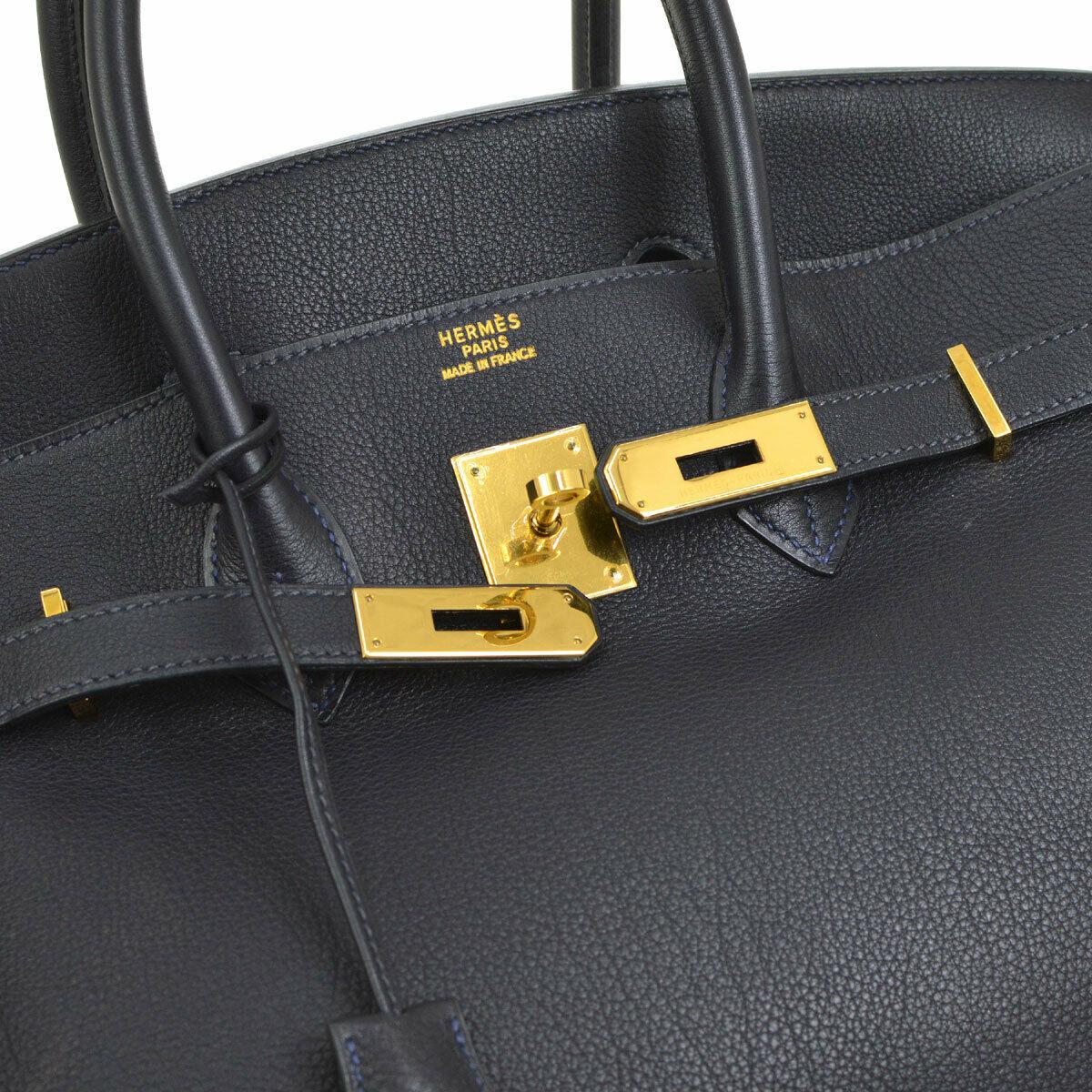 Hermes Birkin 35 Dark Navy Blue Leather Silver Gold Carryall Travel Top Handle Satchel Tote

Leather
Gold tone hardware
Leather lining
Made in France
Handle drop 4.25