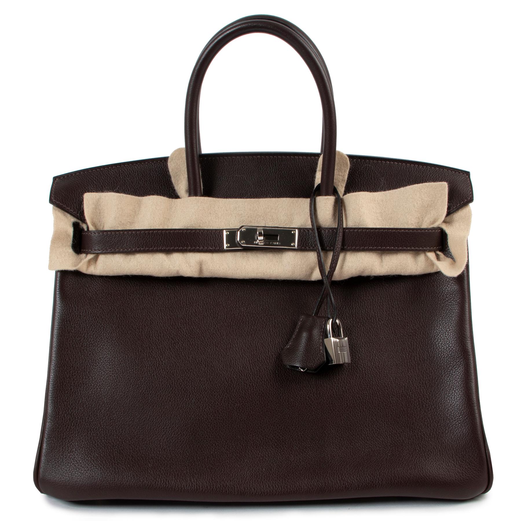 Hermès Birkin 35 Ebene Veau Evergrain Doublure Chevre PHW

This Hermès Birkin 35 Ebene Veau Evergrain Doublure Chevre PHW is a sophisticated addition to your everyday wardrobe. Its 35 size is the perfect fit to hold all your essentials and is the
