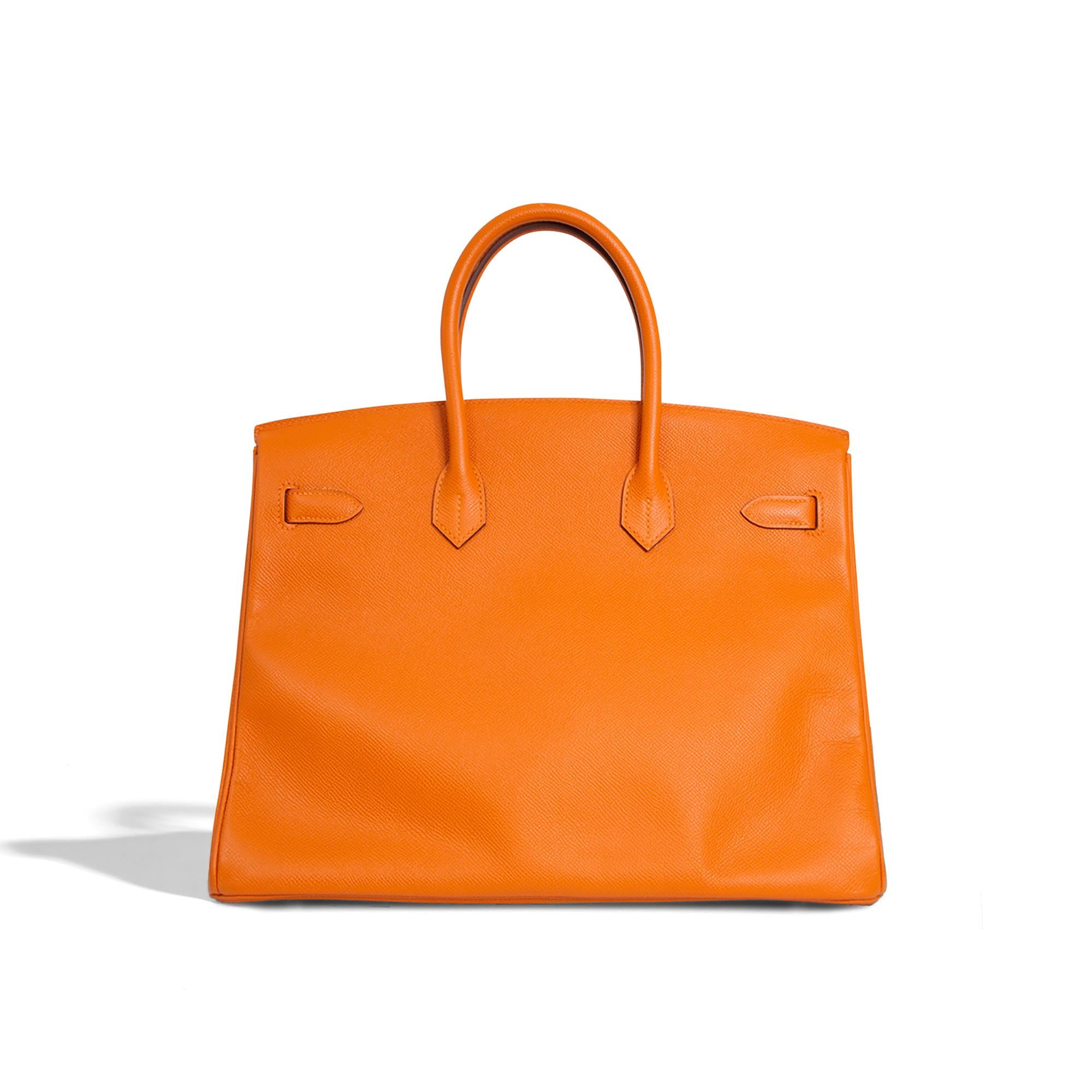 * Expertly crafted 35cm Hermes Birkin made from the durable and luxurious Epsom Leather in orange.
* Embellished with palladium hardware and has a zipped compartment inside to keep your most-used cards close at hand.
* Crafted in 2013.
* Very Good