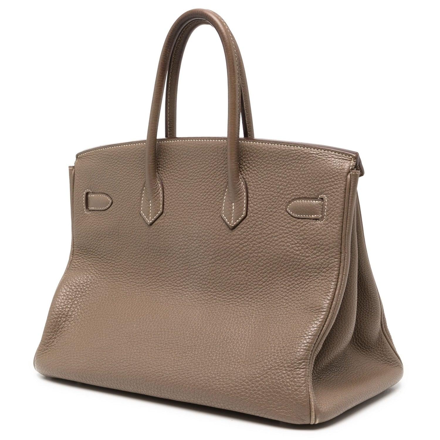 In 1984, Hermès CEO Juan-Louis Dumas boarded a flight and sat beside Jane Birkin. As she stowed away her straw handbag, the contents fell to the floor. As Birkin gathered her belongings, she explained to Dumas that she had not been able to find a