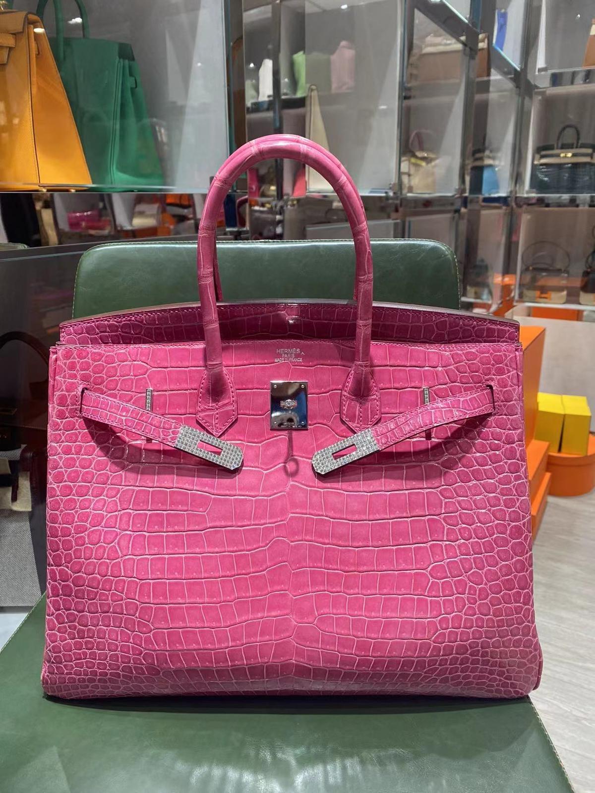 Rare beautiful Barbie pink Hermes Birkin 35 porosus crocodile diamond white gold bag. 
18K white gold hardware. 
Fuchsia color. O stamp
Bag comes with keys, Clochette, locker and dust bag. 
No CITES.
Original Hermes diamonds not aftermarket.
The bag