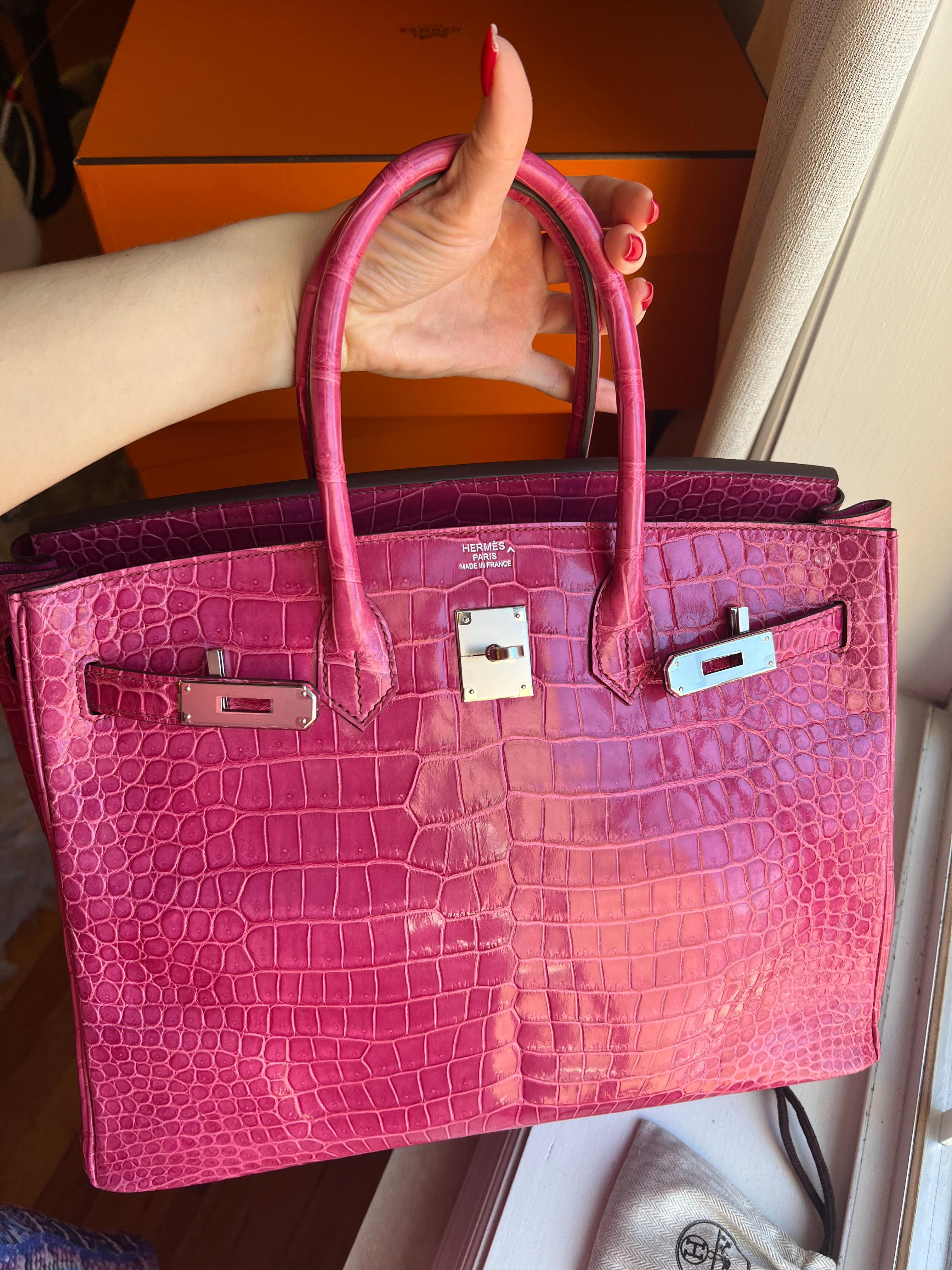 Beautiful Hermes Birkin 35 Rose Tyrien Porosus Crocodile PHW Bag.
Comes with dust bag, box, felt, certificate of autheticity, clochette, key and locker.
Pre loved good conditon. Corners were cleaned and had a minor spa.
R stamp.
PHW.
Plastic on the