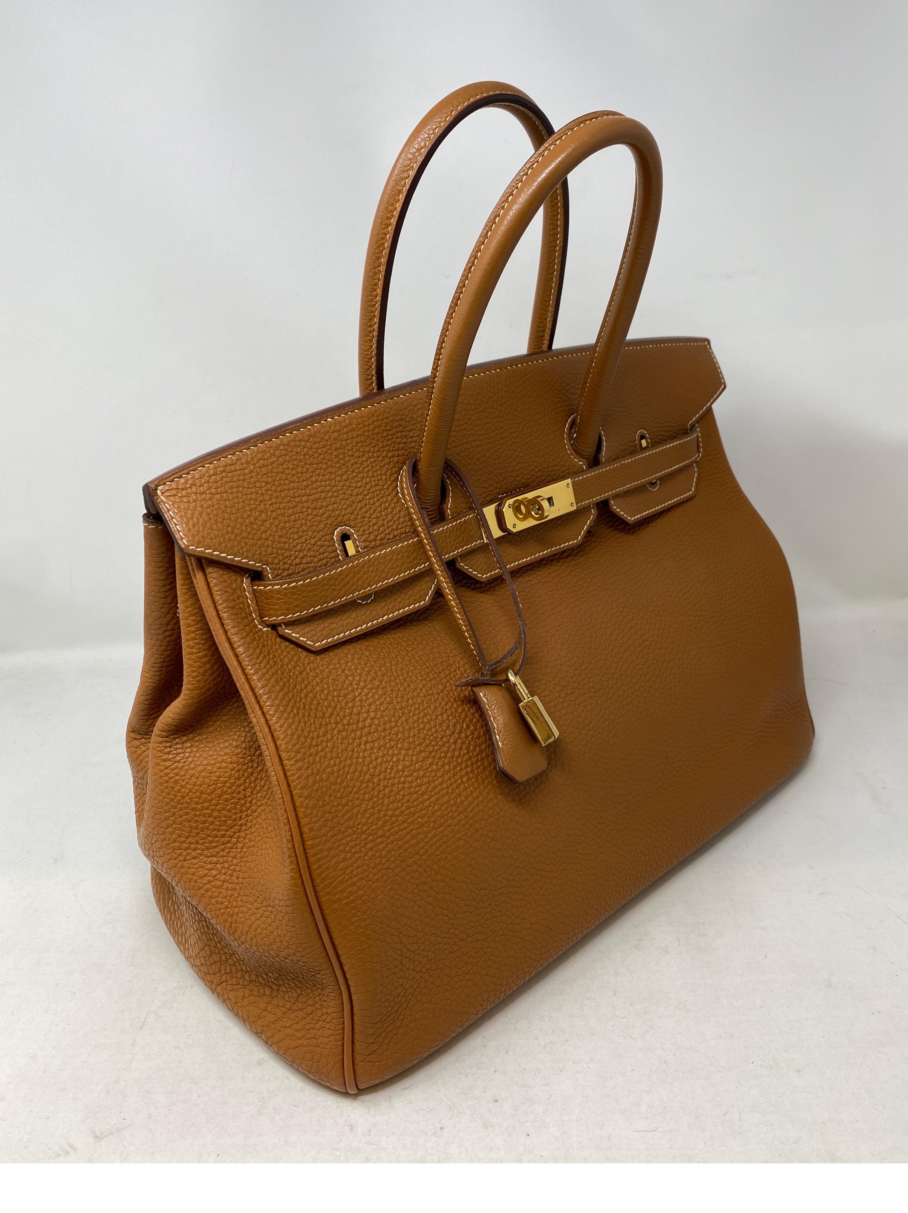 Hermes Gold Birkin 35 Bag. Togo leather with gold hardware. Good condition. Most wanted tan gold color with gold hardware. Includes clochette, lock, keys, and dust cover. Guaranteed authentic. 