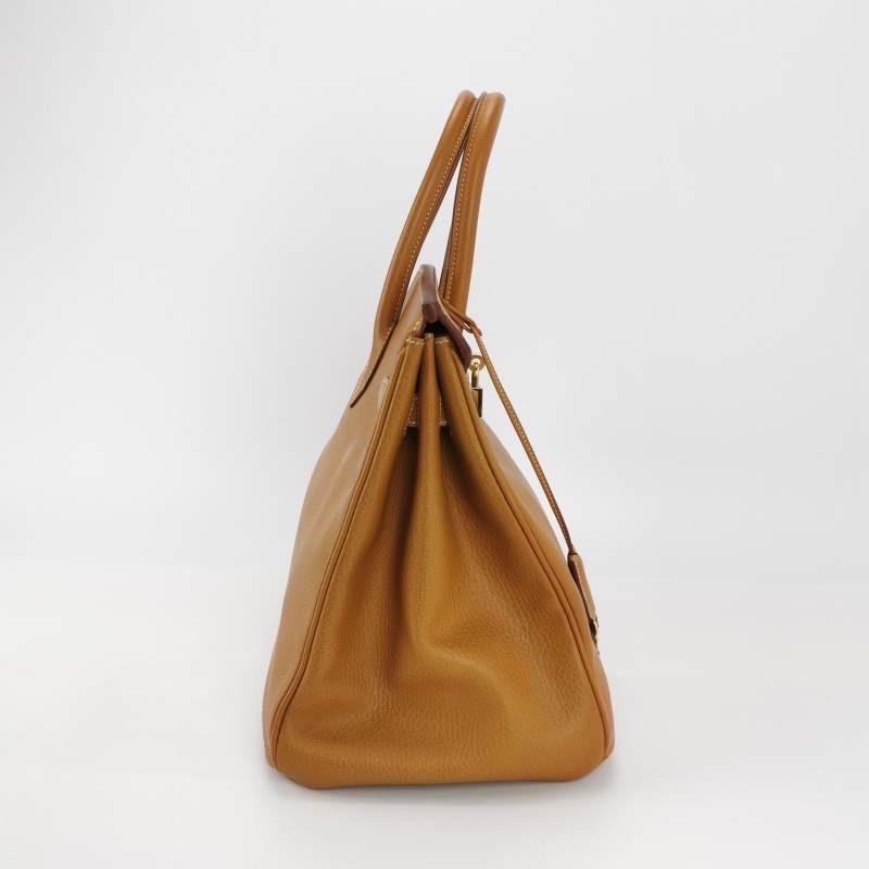 Condition: Good condition.

The color of the handbag has been touched up professionally.

Overall signs of use. Scratches on leather and hardware. Light stains on the inside. Rubbing on the corners, handles, wax on the edges. Leather