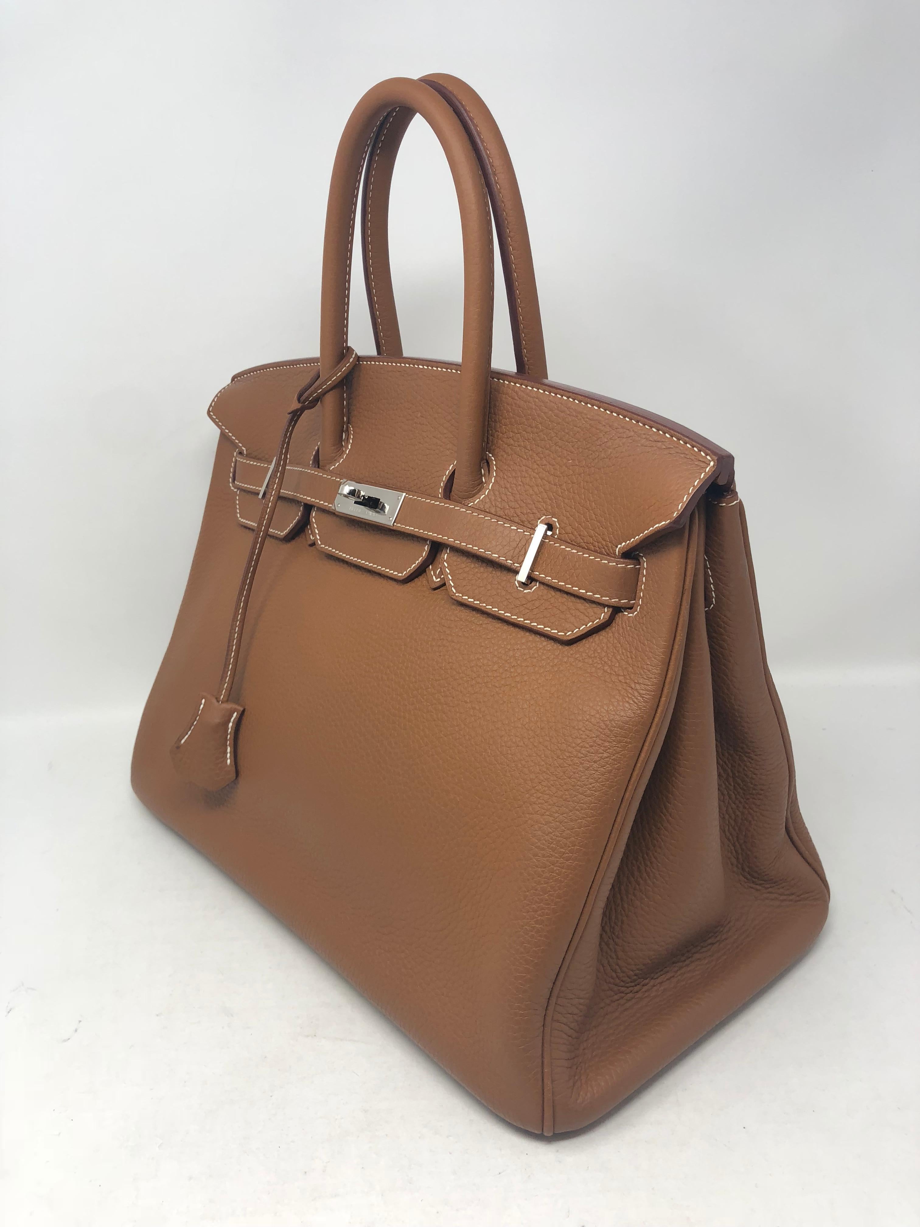 Hermes Birkin 35 Gold Color with Palladium hardware. Beautiful condition. Like new never used. The best neutral color and Hermes color. Highlt coveted and perfect size. Comes with clochette, lock and keys. Don't miss out on this one. Guaranteed