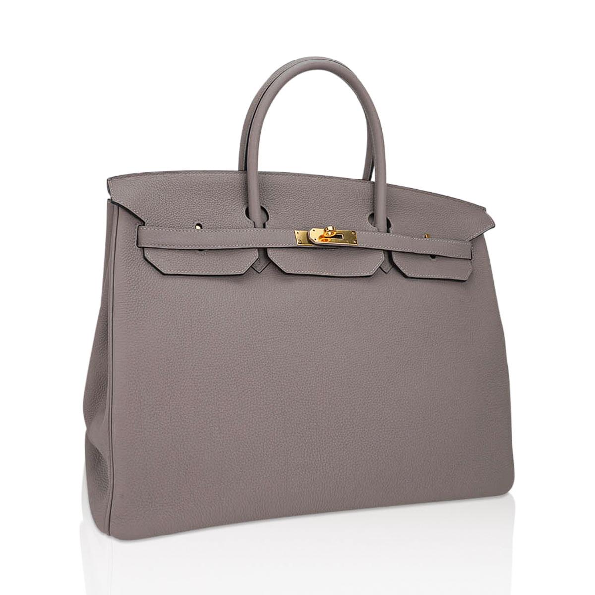 Mightychic offers anHermes Birkin 35 bag Gris Asphalte is neutral perfection - just exquisite!
A perfect hue of gray - Yves Saint Laurent said that gray is the best to showcase all other colours.
Hermes leather in soft Togo is supple and scratch