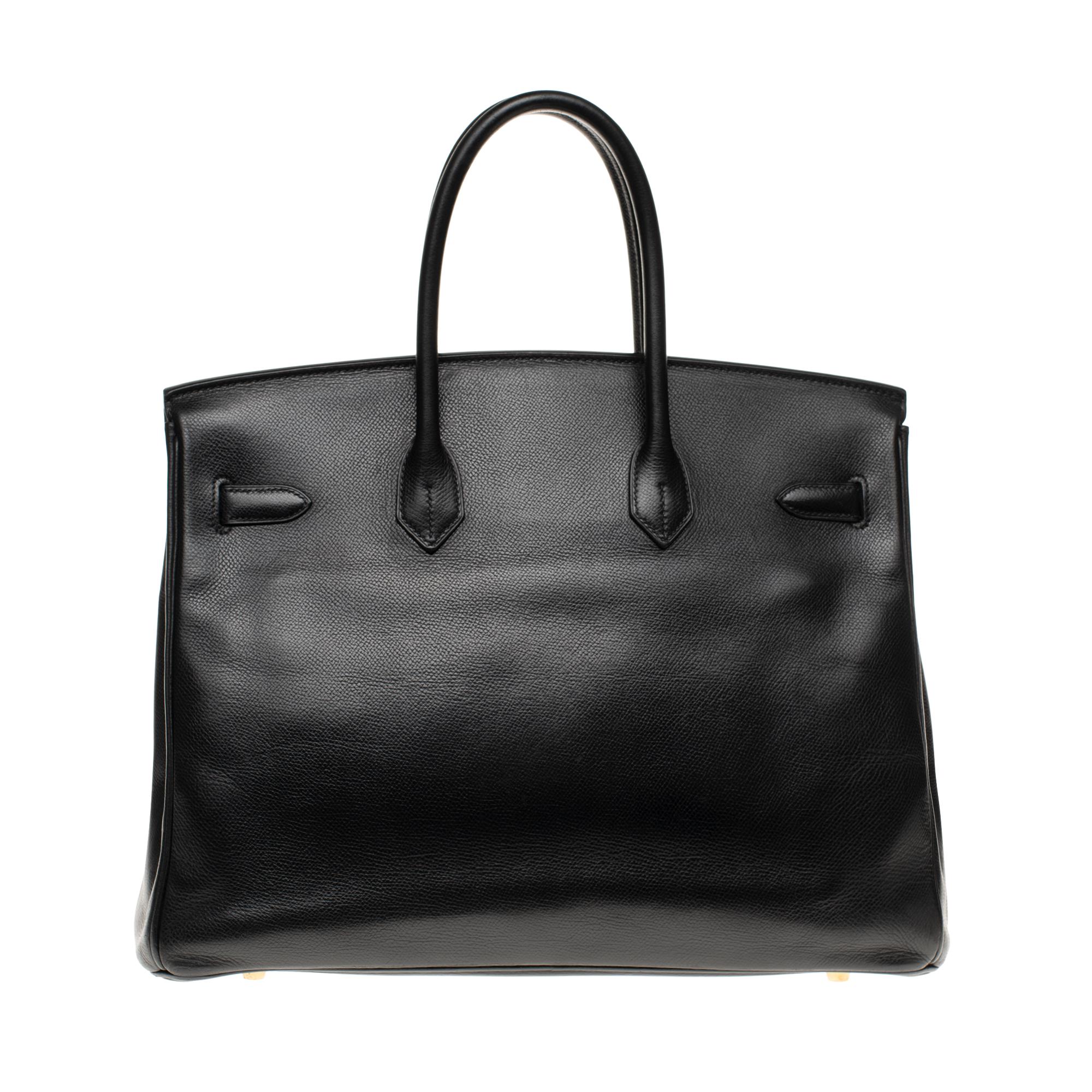 Stunning Hermes Birkin 35 cm handbag in black Courchevel leather, gold metal trim, double gold leather handle for hand-hold.

Shut down by flap.
black leather inner lining, zipped pocket, patch pocket.
Signature: 