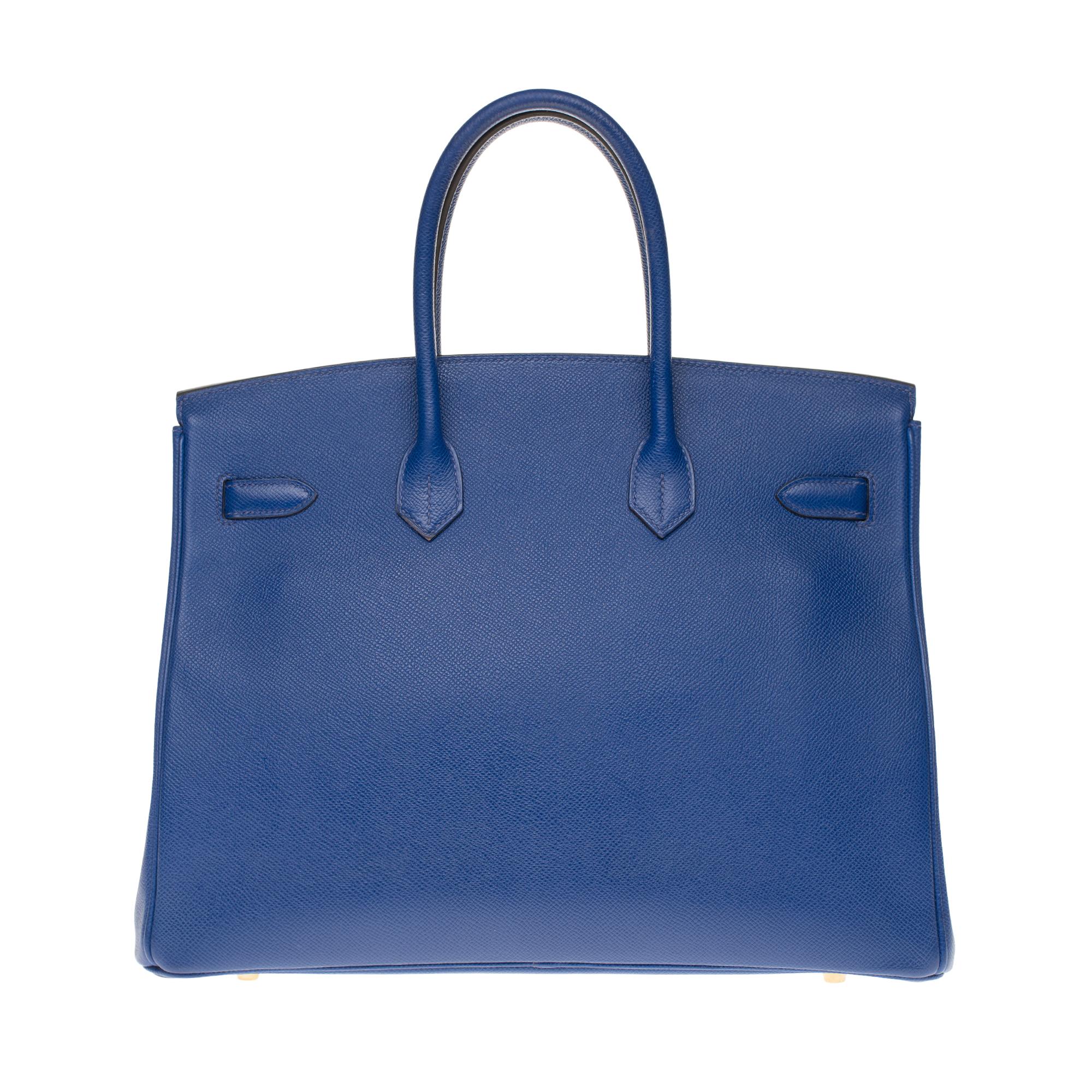 Stunning Hermes Birkin 35 cm handbag in bleu électrique Epsom leather, gold metal trim, double blue leather handle for hand-hold.

Shut down by flap.
Blue leather inner lining, zipped pocket, patch pocket.
Signature: 