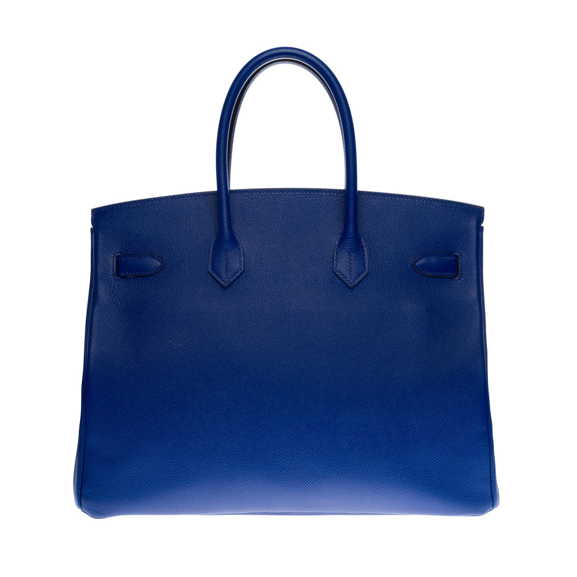 Beautiful Hermes Birkin 35 cm Epsom leather handbag in sapphire blue color, palladium silver metal hardware, double handle in blue leather allowing a handheld
Flap closure
Lining in blue leather, one zip pocket, one patch pocket
Signature: 