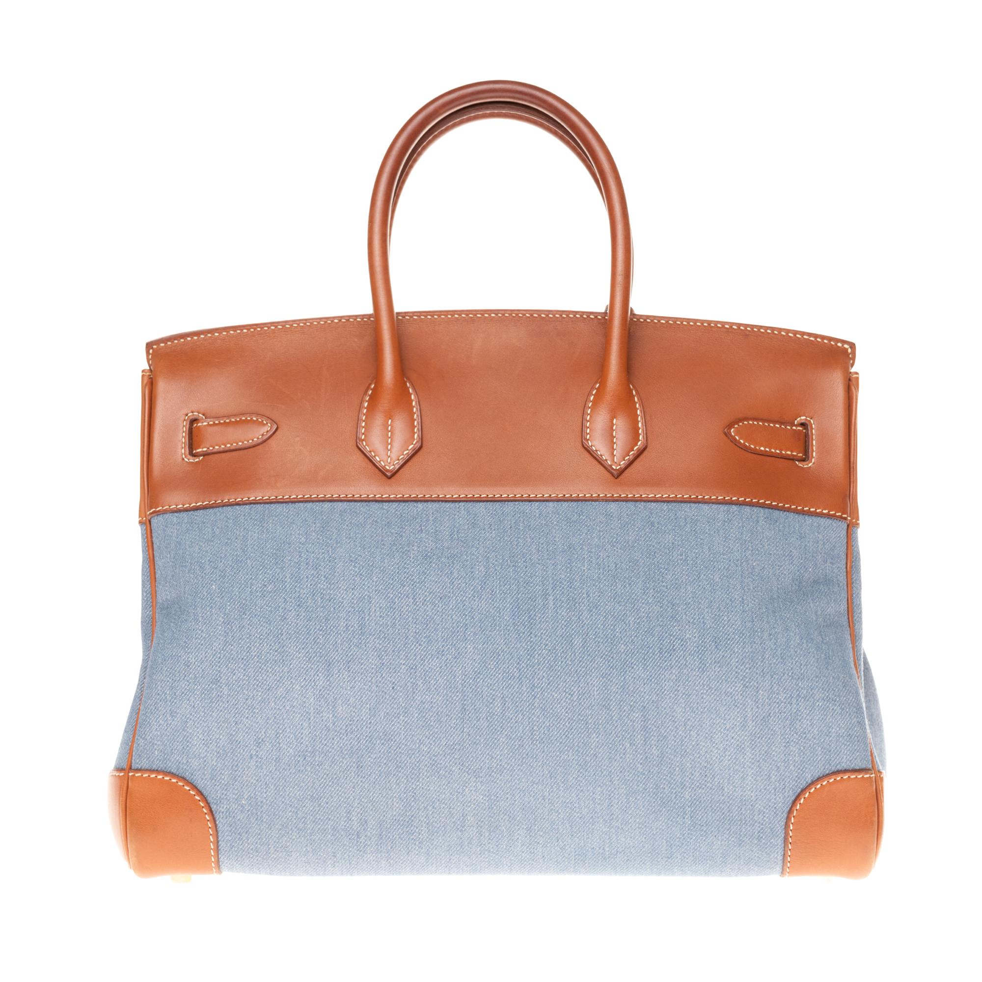 Stunning and rare Hermès Hermes 35cm Birkin in double-material brown barenia leather and blue denim , gold-plated silver metal trim, double handle in brown barenia leather allowing a handheld. 
Flap closure. 
Brown leather inner lining, one zipped