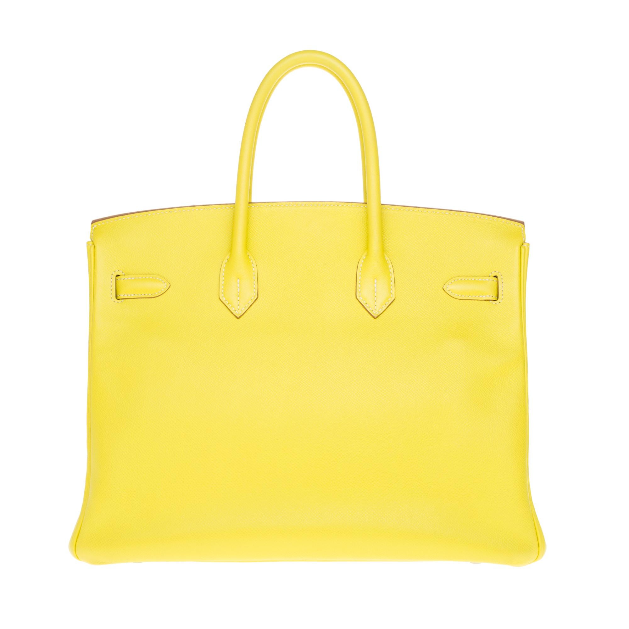 Amazing and rare Hermes Birkin 35 cm handbag Two-tone leather Epsom lemon yellow , inner tourterelle grey, Palladium silver metal hardware, double handle in yellow leather allowing a handstand.

Closure by flap.
Lining in grey leather, a zipped