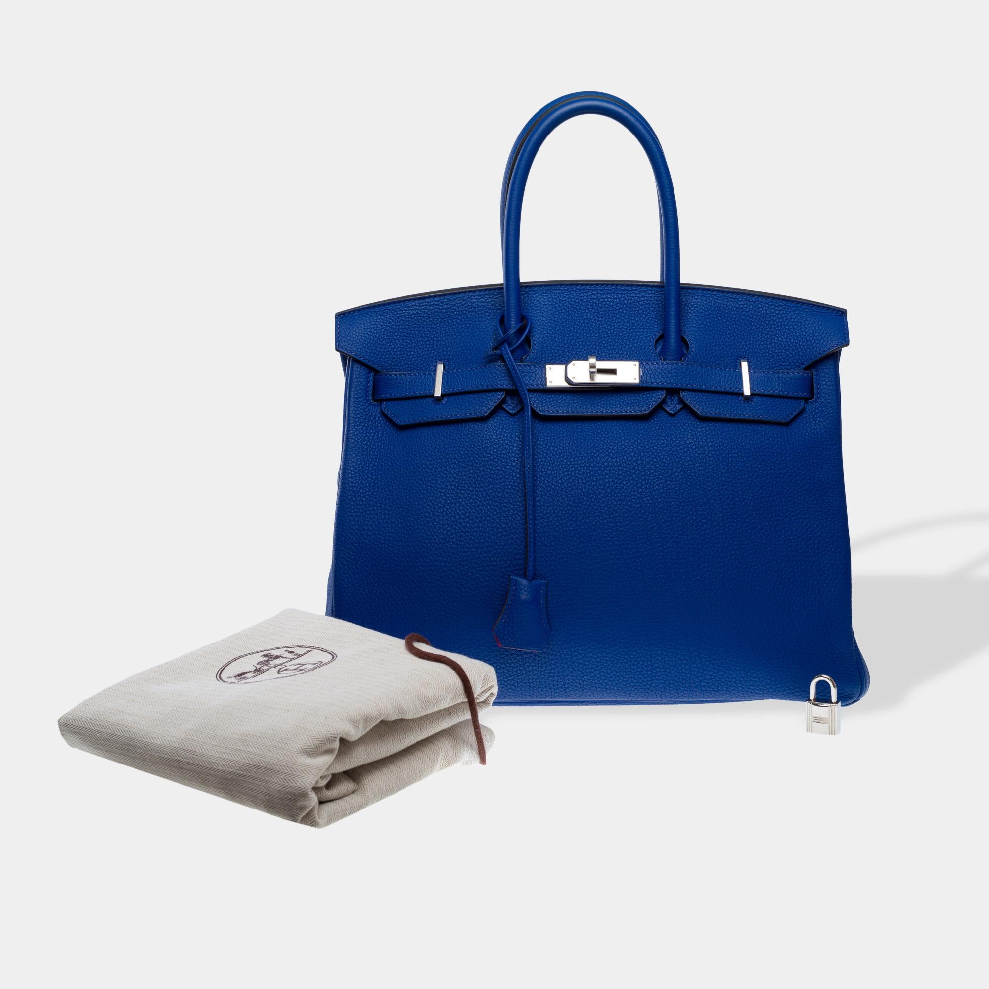 Sublime​ ​Hermes​ ​Birkin​ ​35​ ​HSS​ ​(Special​ ​Order)​ ​handbag​ ​in​ ​electric​ ​blue​ ​Togo​ ​calf​ ​leather​ ​with​ ​pink​ ​Fuchsia​ ​interior,​ ​silver​ ​Palladium​ ​metal​ ​trim,​ ​double​ ​blue​ ​leather​ ​handles​ ​for​ ​hand​