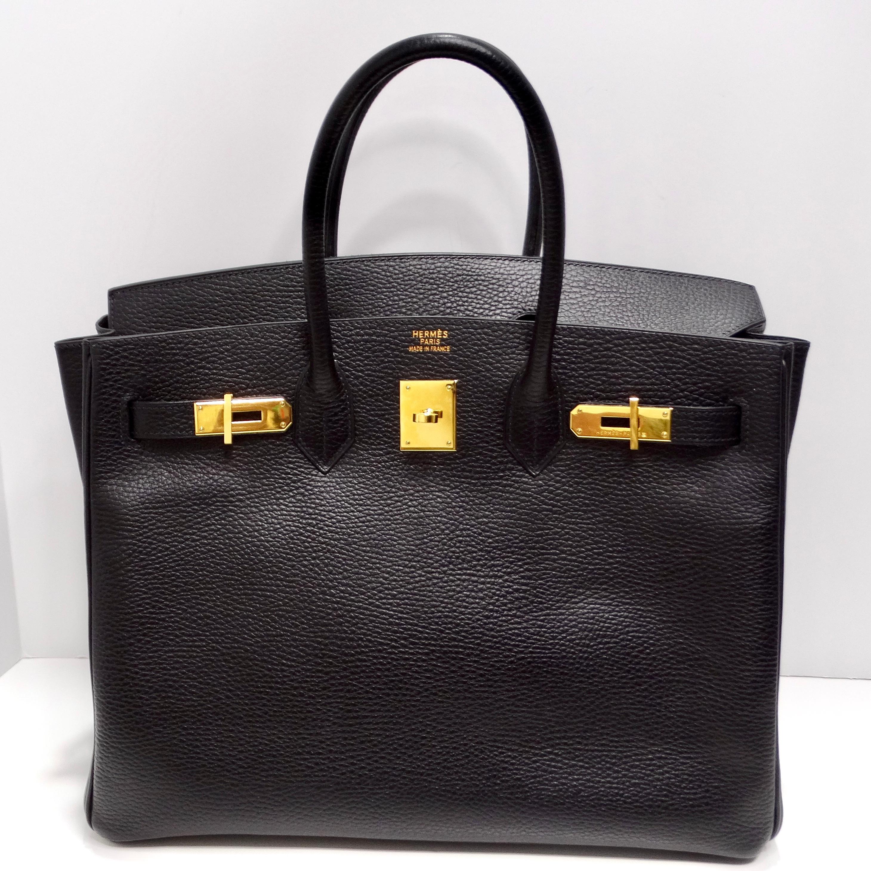 The Hermes Birkin 35 in Ardennes Leather Black is indeed an iconic and timeless piece that exudes luxury and sophistication.

Crafted from luxurious Ardennes leather in classic black, this Birkin epitomizes understated elegance and versatility. The