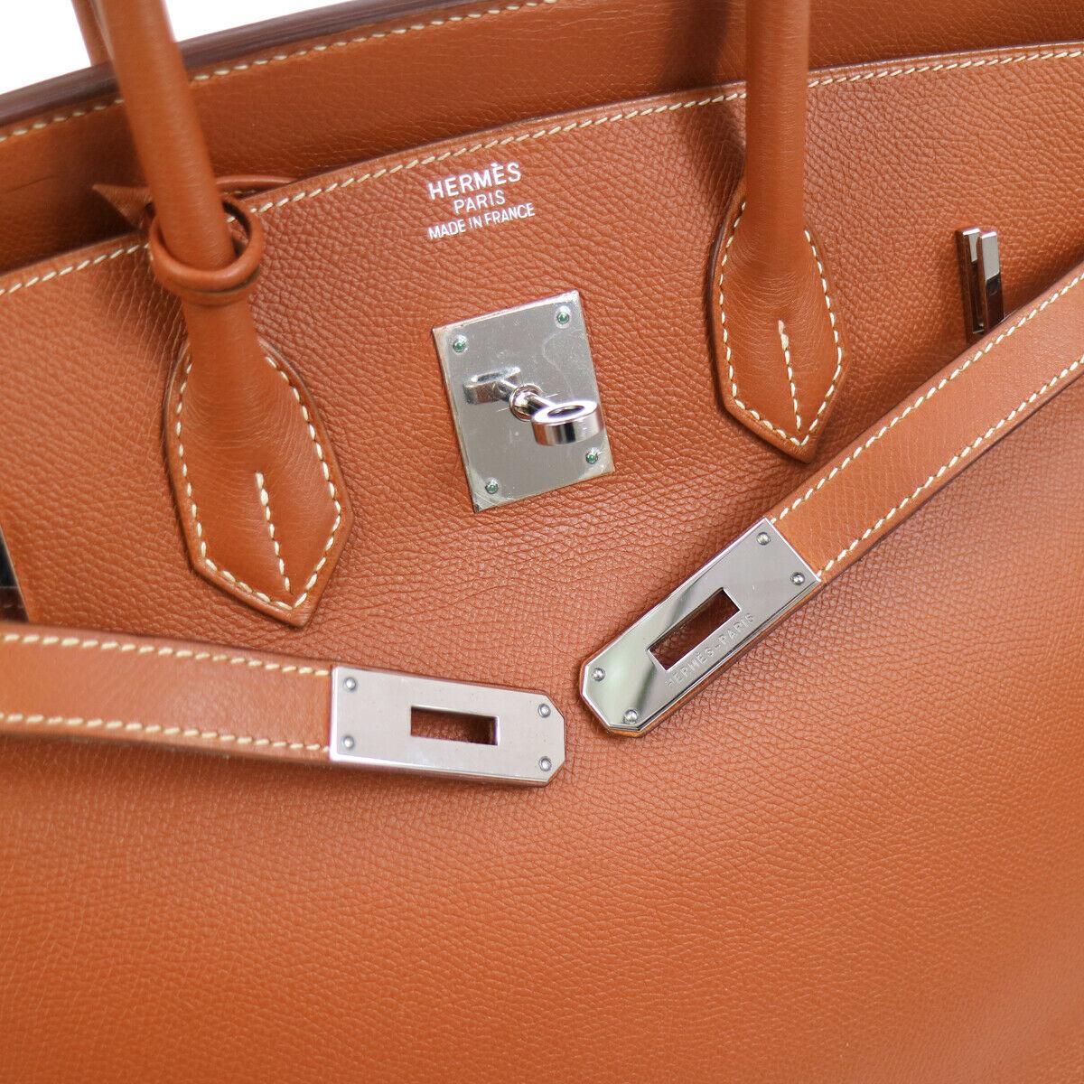 Hermes Birkin 35 Burnt Orange Red Leather Silver Carryall Travel Top Handle Satchel Tote

Leather
Palladium tone hardware
Leather lining
Date code present
Made in France
Handle drop 4.25