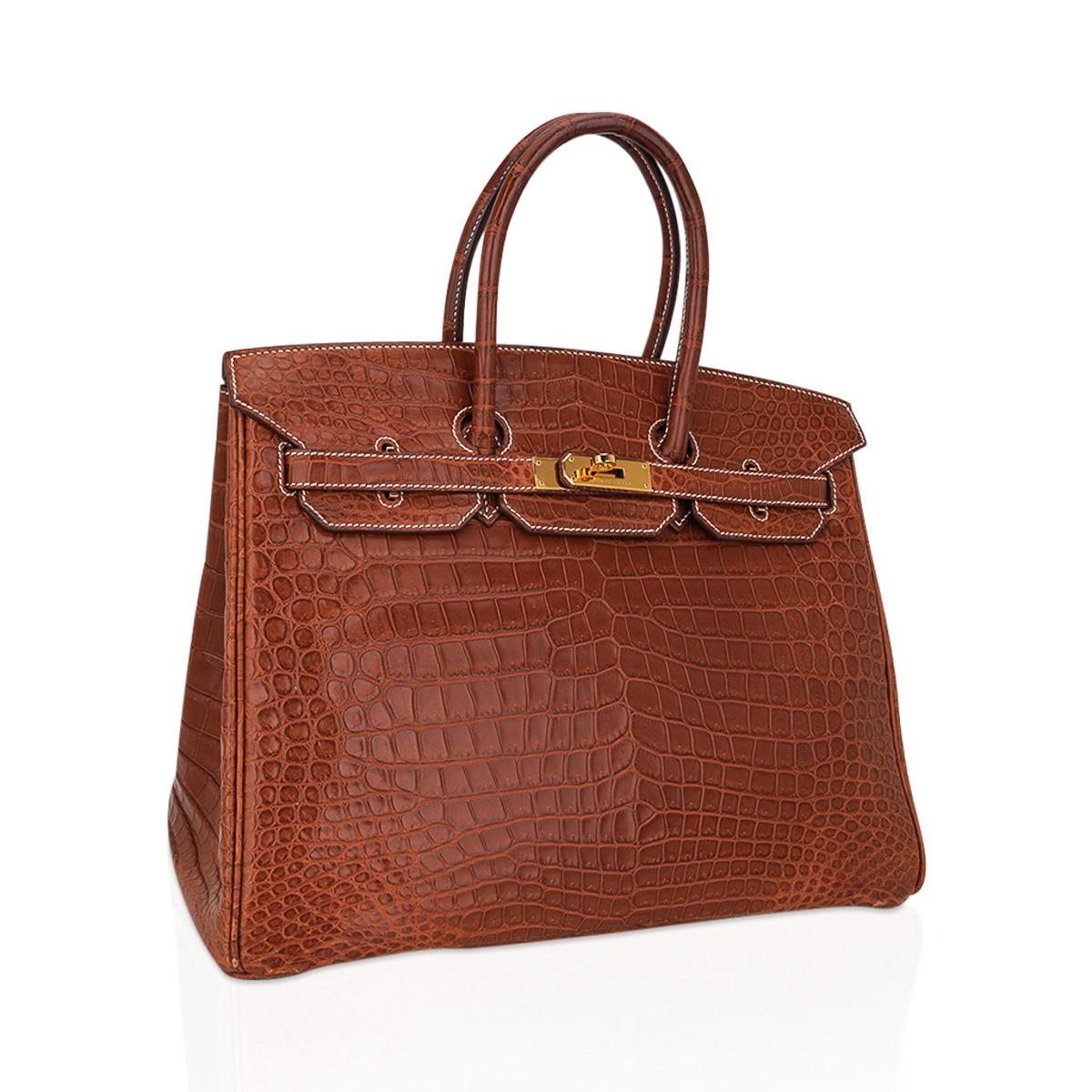 Mightychic offers an Hermes Birkin 35 bag featured in matte Fauve Porosus Crocodile.
Neutral perfection for year round wear, this chic bag is a must for any Hermes collector.
Rich with gold hardware and accentuated with the signature bone top