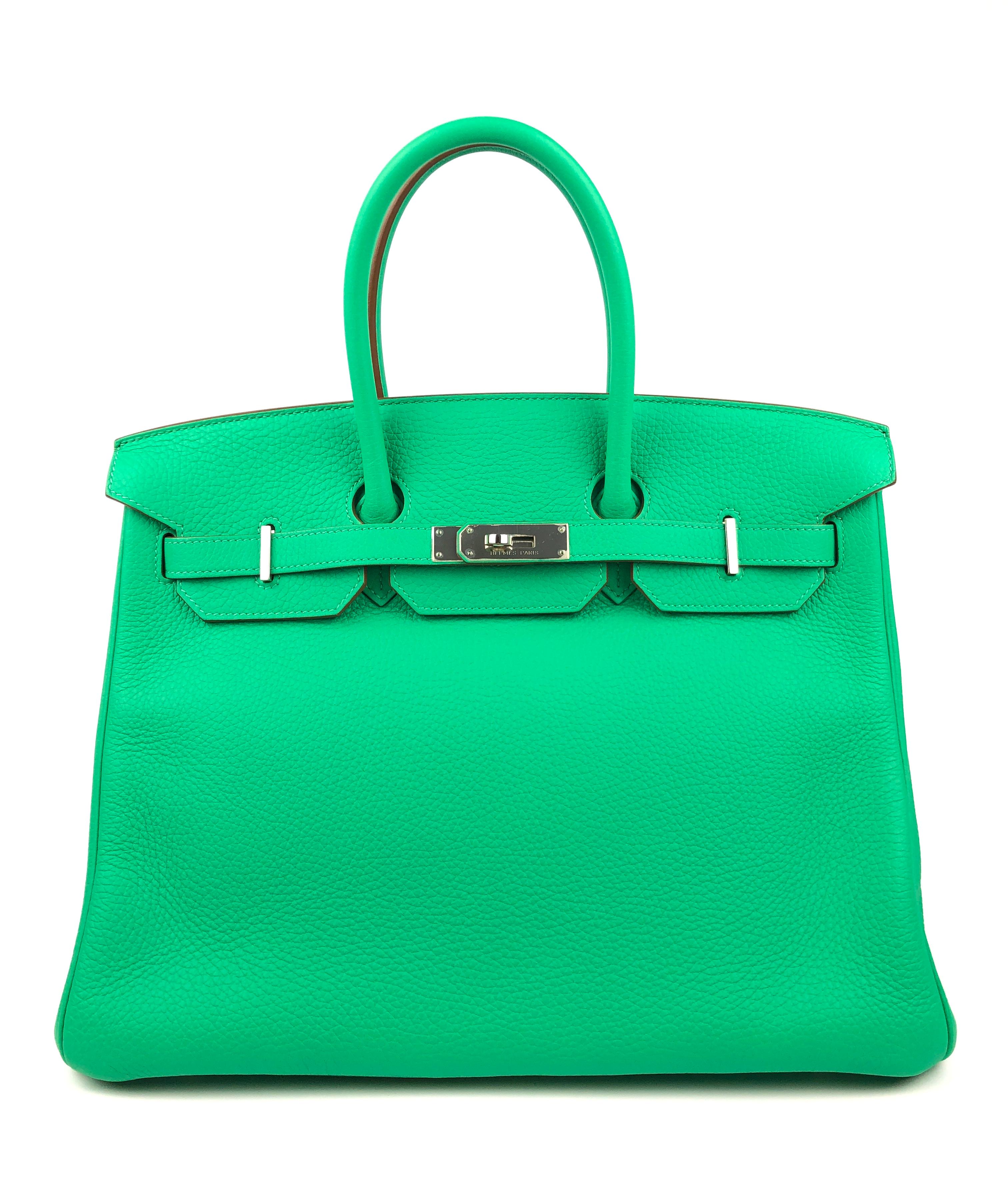 Stunning Like New Hermès Birkin 35 Menthe Mint Green complimented by Palladium Hardware. Plastic on all hardware and perfect structure and corners. 
