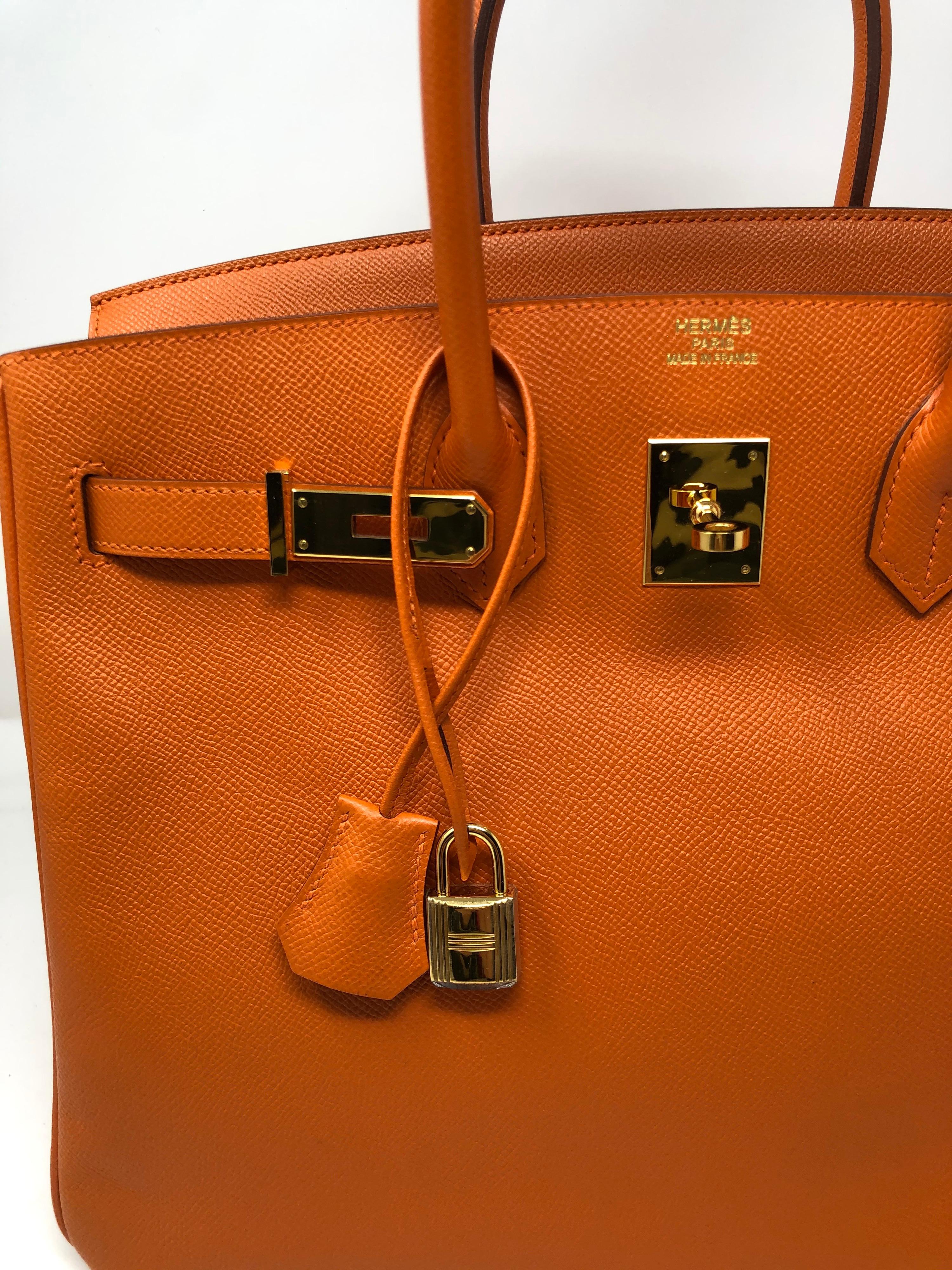 Hermes Orange Birkin 35 with Gold Hardware. Excellent condition. Veau Epsom Leather. From 2012. Includes full set. Will include clochette, lock and keys, dust cover and box. Guaranteed authentic. 
