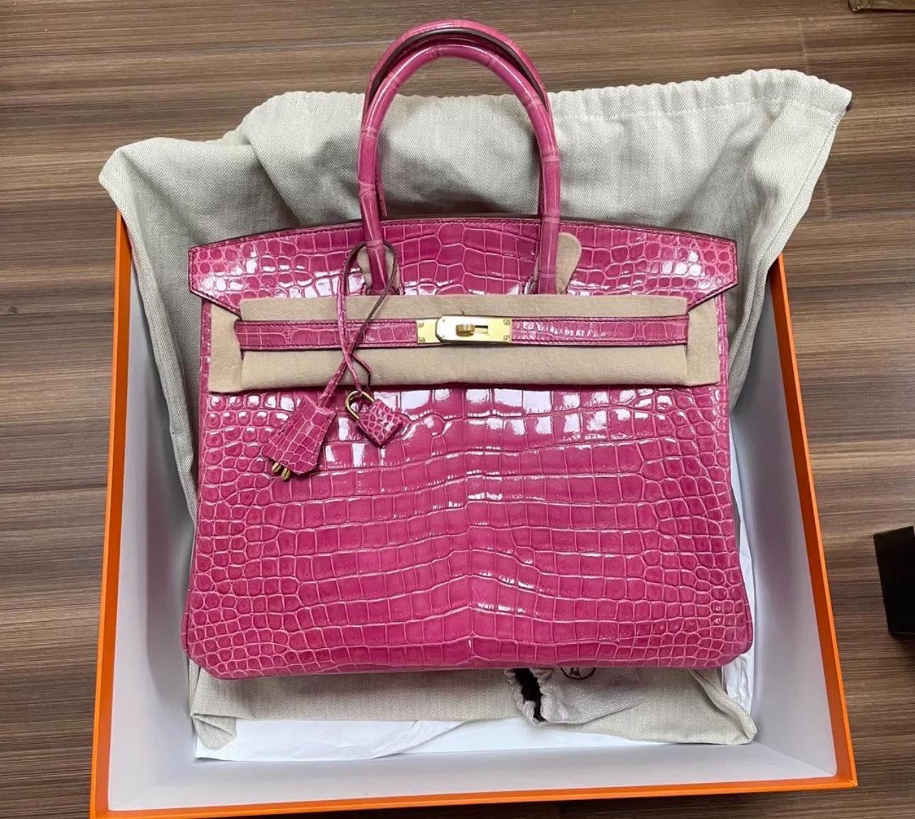 Rare Hermes Birkin 35 Pink crocodile proposes bag. P stamp . New condition with plastic still attached to the metal. Comes with dust bag,box, keys,Crockett and locker. Gold hardware. 
