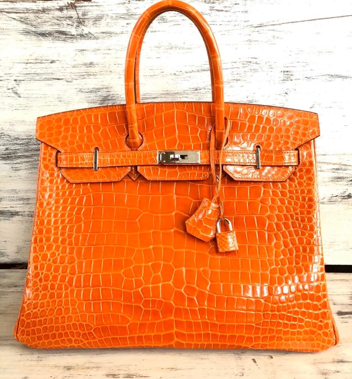 
Pristine Hermes Birkin 35 Porosus Crocodile Fire Orange Palladium Hardware. O stamp 2011. Excellent Condition Light Hairlines on Hardware. Best Price on eBay! Includes Lock, Clochette and Dust Bag. From Collectors Closet.

Shop with Confidence from