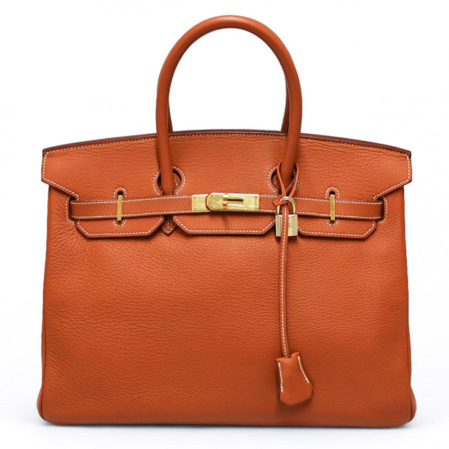 Vintage Hermès Birkin 35 bag from 1997 in pumpkin color with gold hardware. Will be delivered in its original Hermès dustbag.
Condition: very good
Made in France
Model: Birkin 35
Material : grained leather
Interior : leather 
Color :