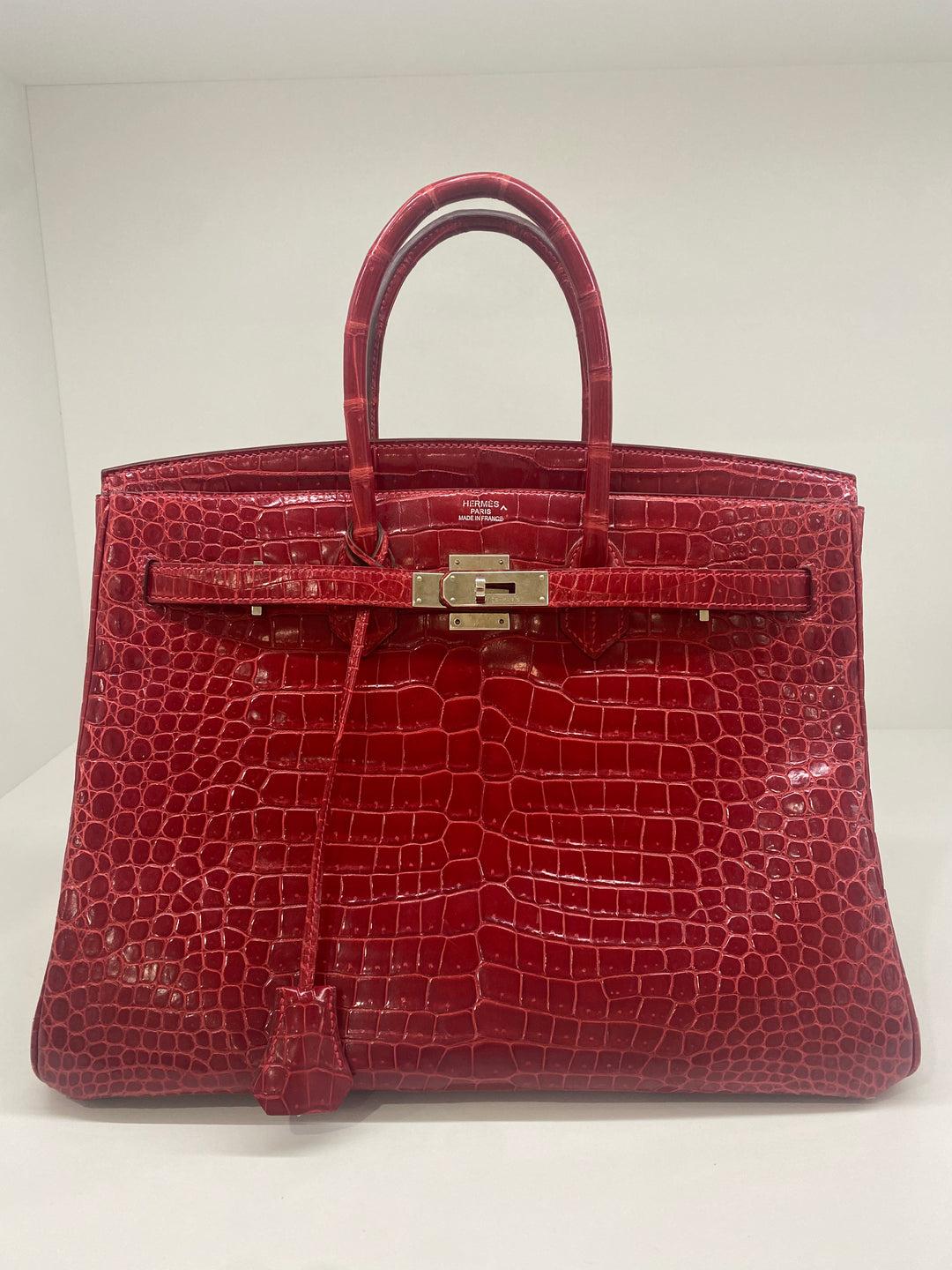 Condition: ﻿Very good used condition

Material: Shiny Alligator

Colour: Red

Hardware: Palladium 

Year: 2011

Inclusion: key & dust bag 

Authenticity: Authenticity Guaranteed or fully refundable

Shipping: Express Shipping Domestic and