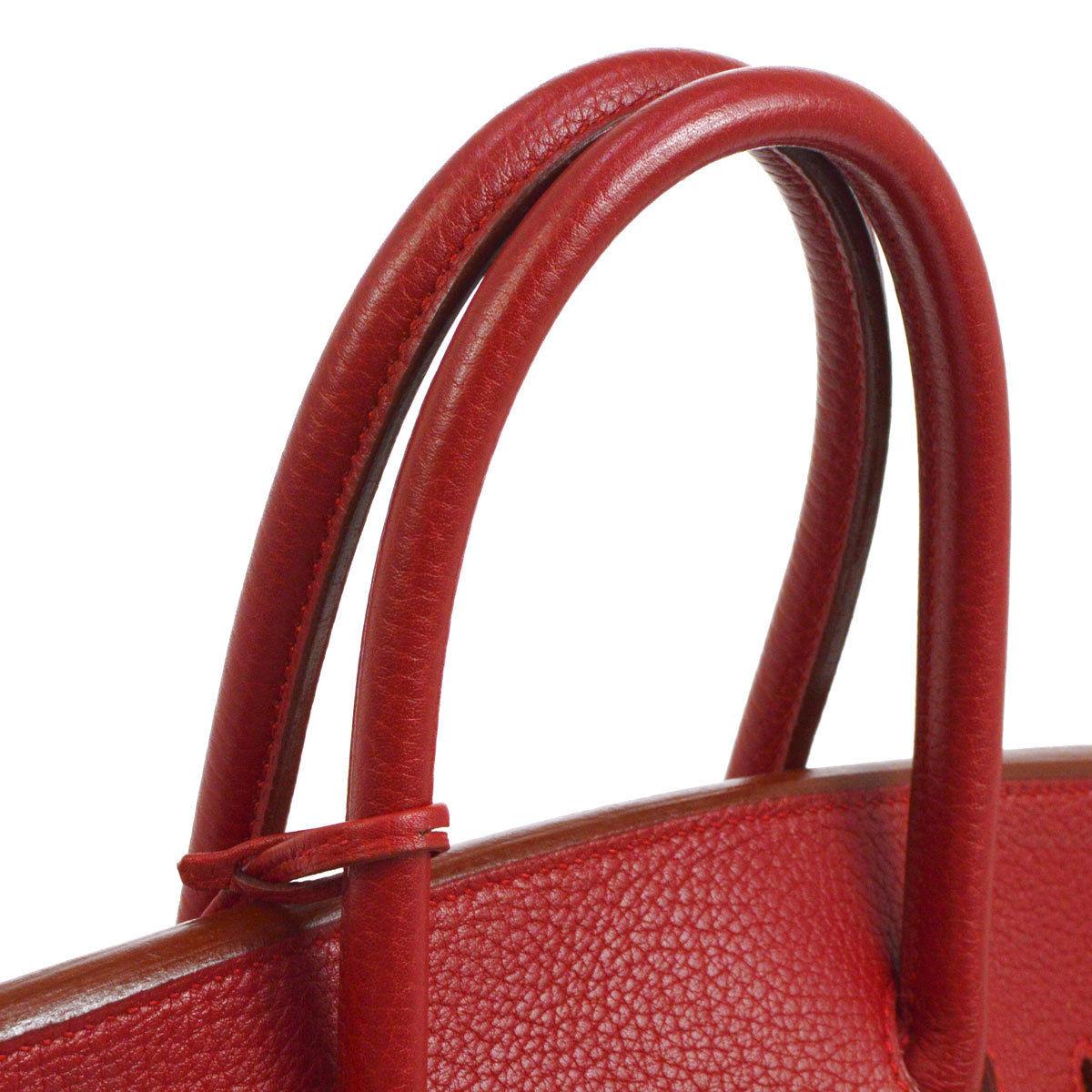 Hermes Birkin 35 Red Leather Gold Top Handle Satchel Travel Tote Bag

Leather
Gold tone hardware
Leather lining
Date code present
Made in France
Handle drop 4