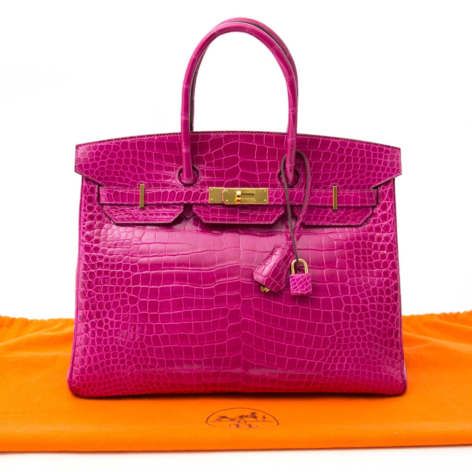 Definitely Hermès most illustrious porosus pink croc color, which is extremely hard to get!

This Hermès Birkin is incredibly rare and featured in the rose Sheherazade color, which is a stunning pink tone.

Porosus crocodile skin can be recognized