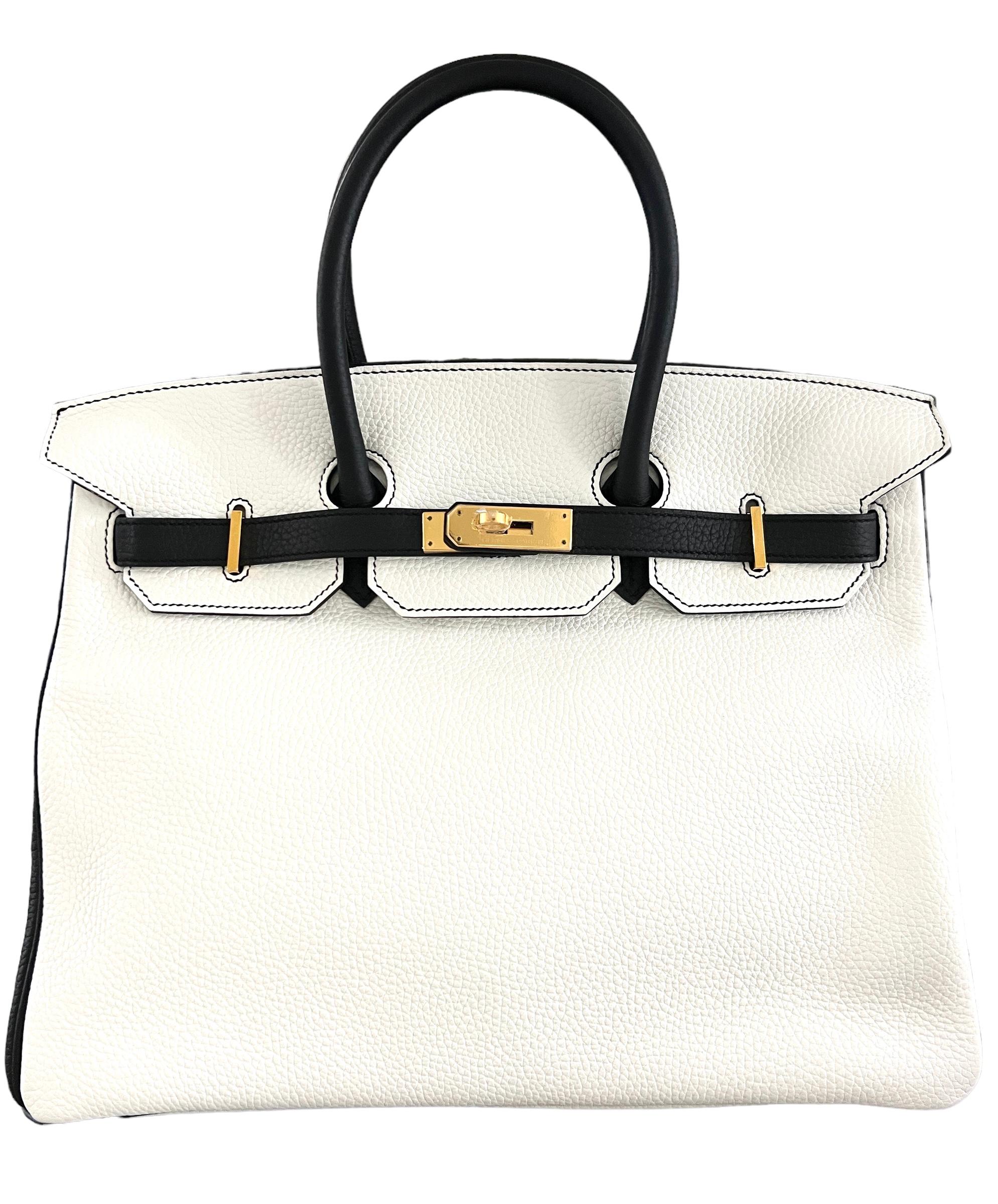 Absolutely Stunning Grail 1 of 1 Special Order Hermes Birkin 35 Black Noir, White Togo Leather Gold Hardware. Plastique sur la quincaillerie. Condit Presque comme neuf Avec plastique sur toute la quincaillerie. 2016 X Stamp.

Achetez en toute