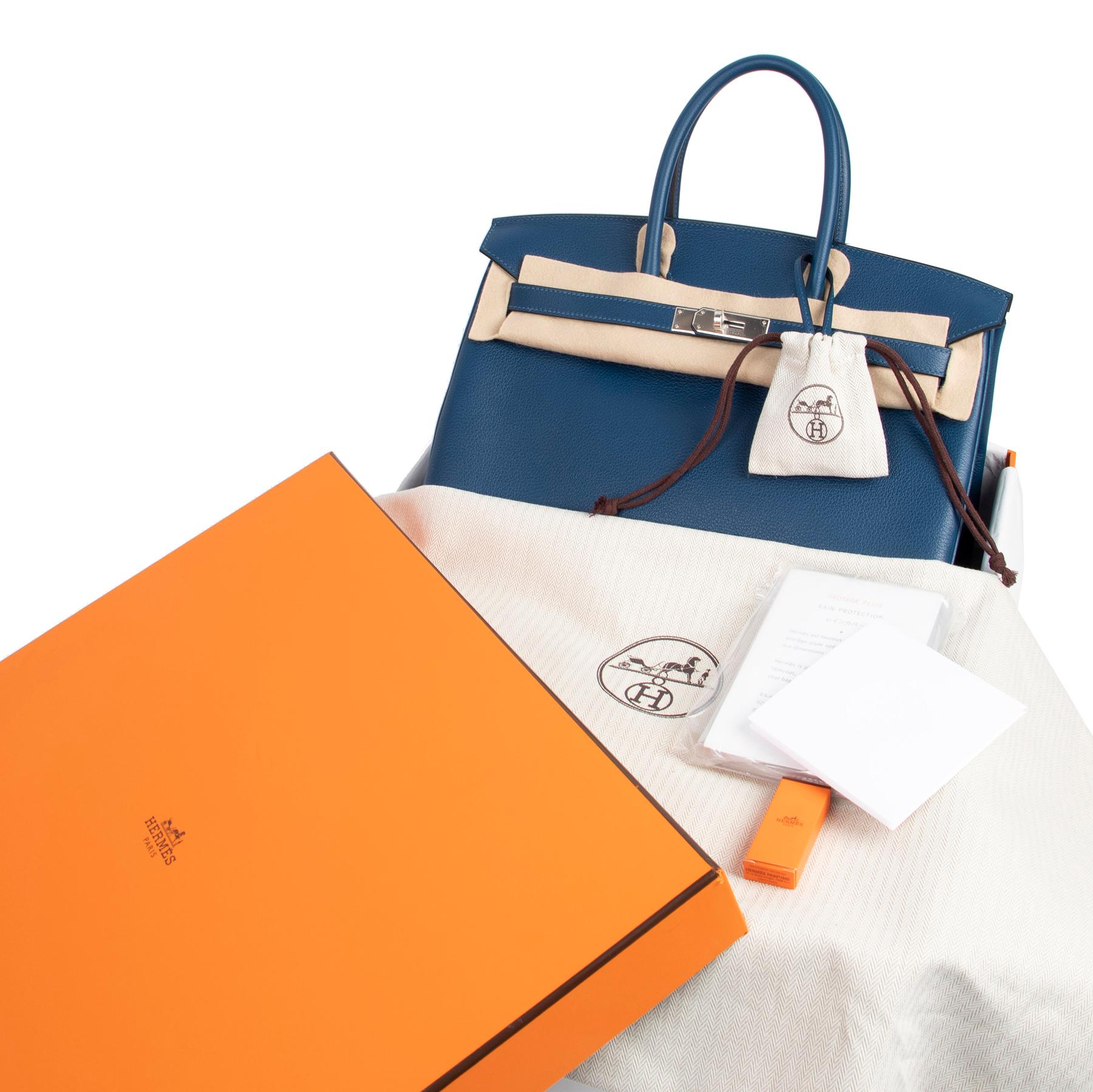Hermès Birkin 35 Taurillon Novillo Deep Blue PHW

This brand new Hermès Birkin is crafted out of finely grained Taurillon Novillo and comes in a breathtaking shade of blue. The color is deep and has many layers - you'll see it pairs beautifully with