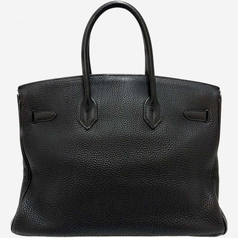 Hermes Birkin 35 Togo Black in very good condition. Zipper, clochette, keys (2) and padlock included. 
The corners are slightly used and there are micro-scratches on the hardware.

Condition : Very good
Country of manufacture : France
Material :