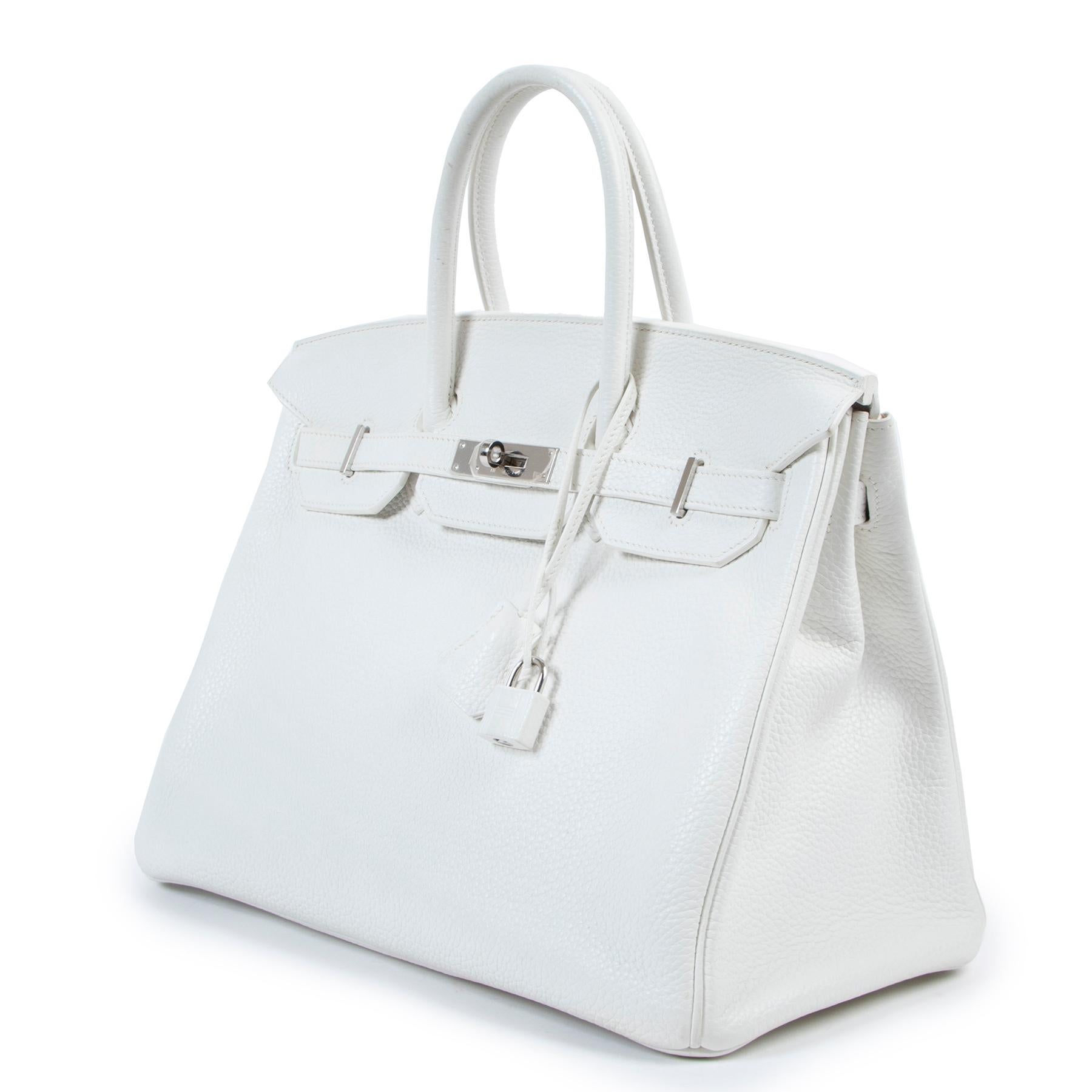 Hermès Birkin 35 White Taurillon Clemence PHW

This snowwhite Birkin bag is extremely unique and highly sought-after. The pebbled leather and silver hardware are a match made in heaven, as this beauty will elevate any look. The Birkin by Hermès is a