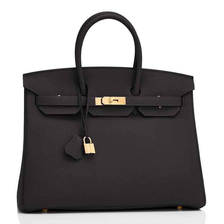 Hermes Birkin 35cm Black Togo Gold Hardware Bag U Stamp, 2022
Brand New in Box. Store fresh. Pristine Condition (with plastic on hardware).
Just purchased from Hermes store; bag bears new 2022 interior U stamp.
Perfect gift! Comes with lock, keys,