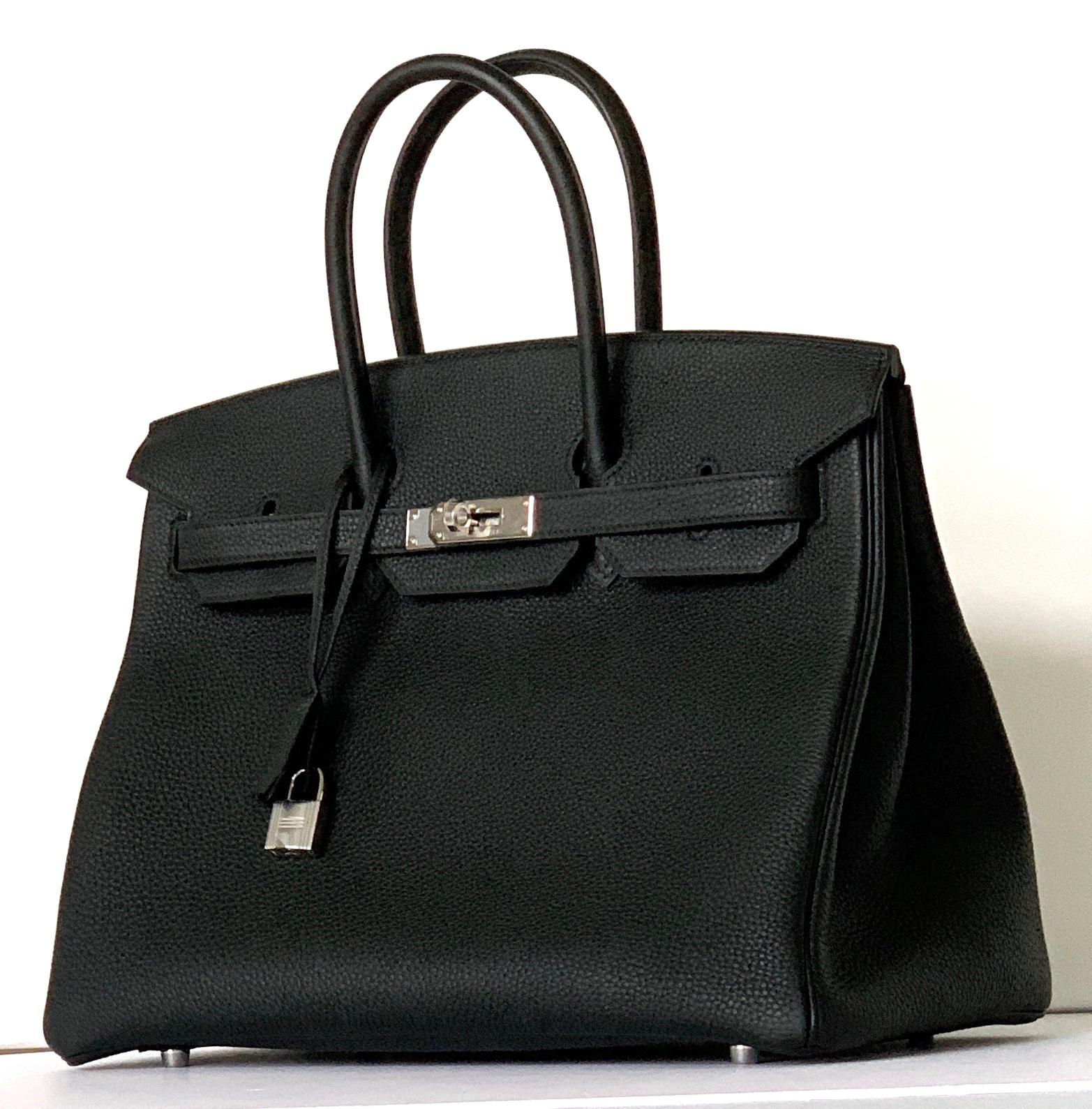 Hermès Birkin  
35cm Black Togo
Togo is a pebbled leather that is loved because it is scratch resistant
Palladium Hardware
One of the most sought after combinations of the black with silver
Collection D, the newest from Hermes
This Birkin has tonal