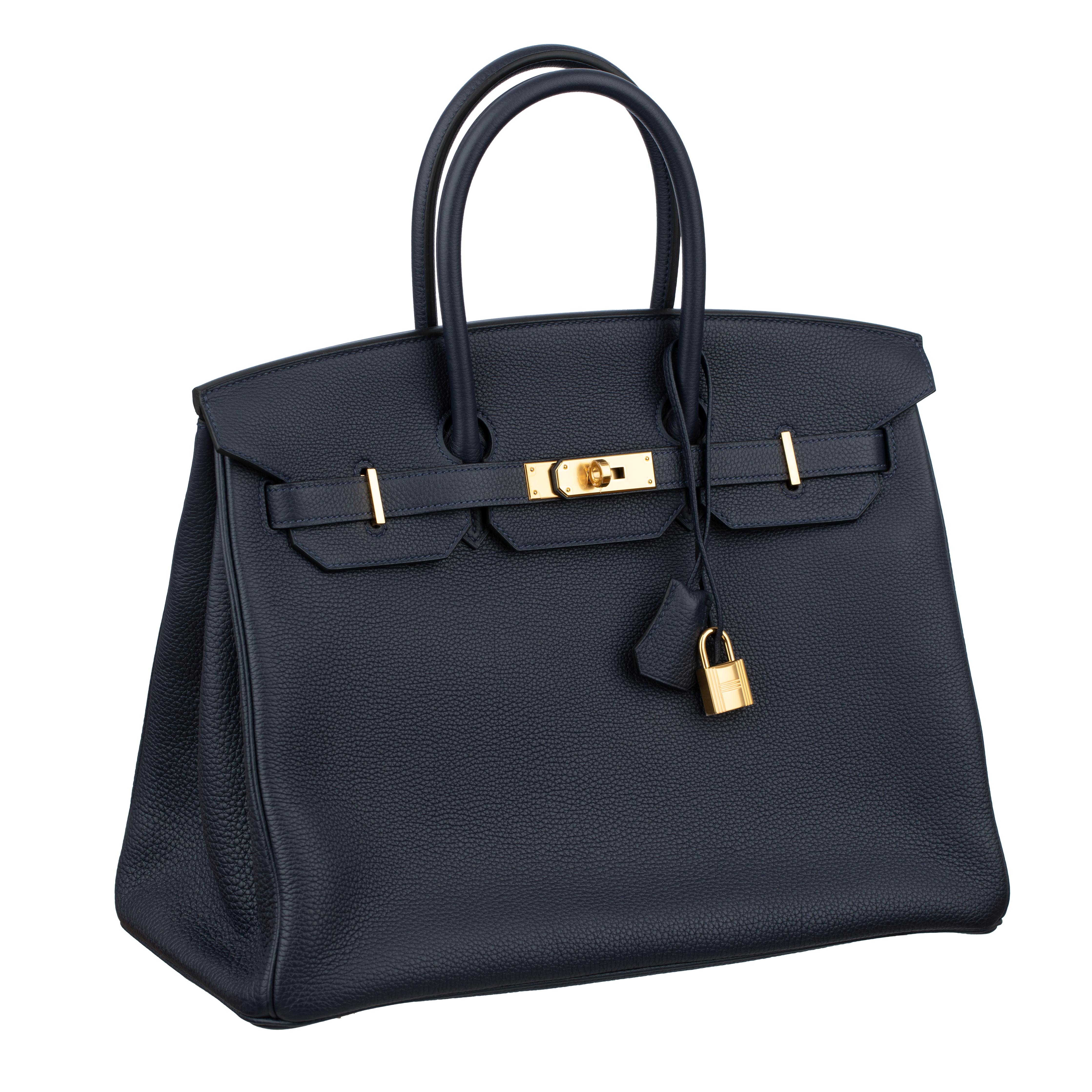 HERMES BIRKIN 35CM BLUE NUIT TOGO LEATHER GOLD HARDWARE

Brand: Hermes

Product: Birkin Retourne

Size: 
CM: L 35 cm x H 25 cm x D 18 cm
INCH: W 14