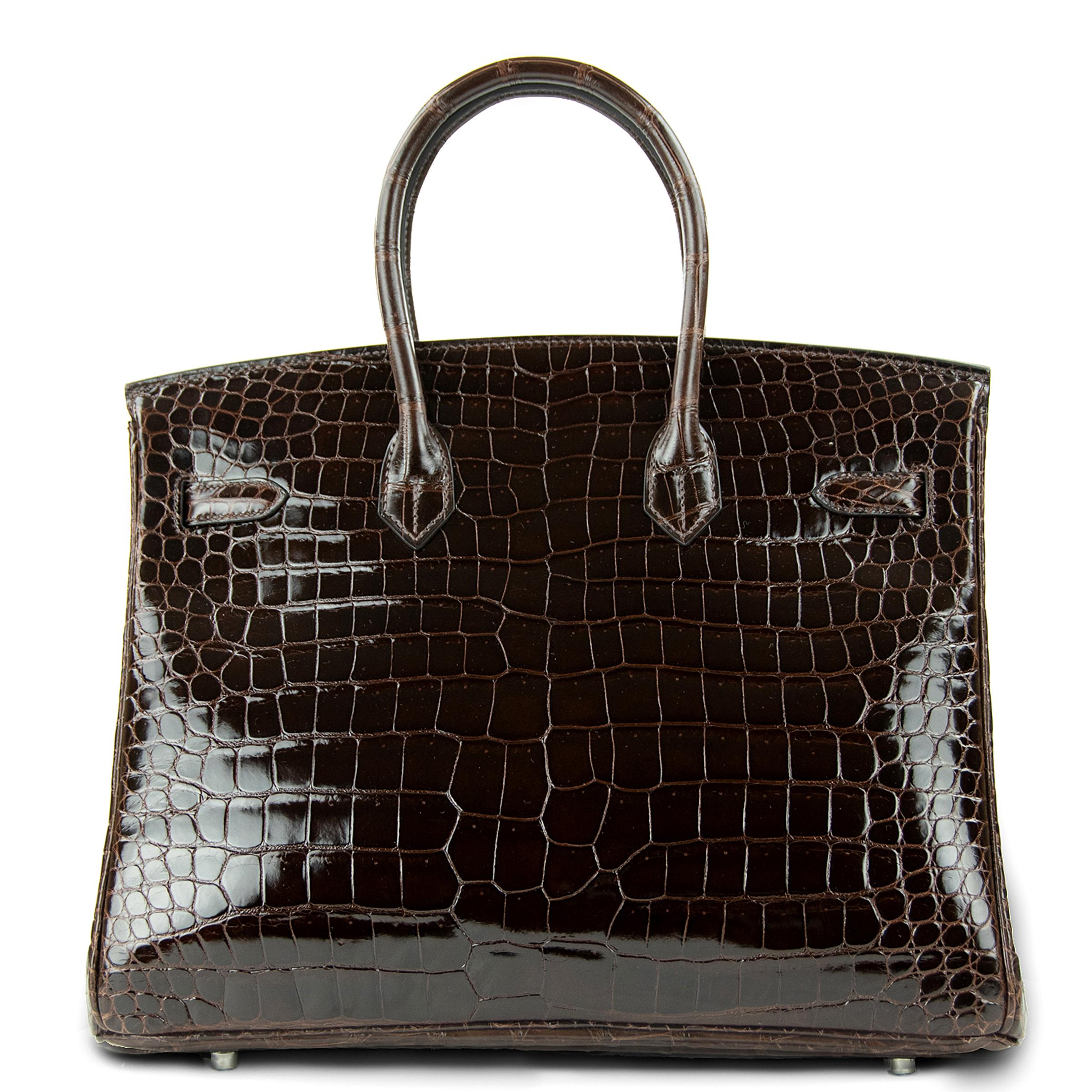 Hermes 35cm Birkin in Chocolate Brown Porosus Crocodile. This iconic special order Hermes Birkin bag is timeless and chic. Fresh and crisp with palladium hardware. 

    Condition: New or Never Used
    Made in France
    Bag Measures: 35cm (13.8