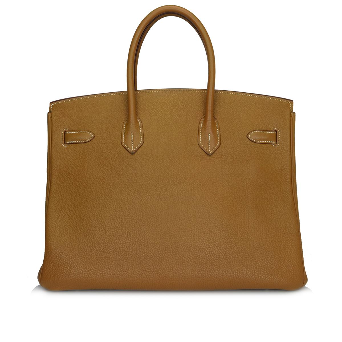 Hermès Birkin 35cm Gold Togo Leather with Palladium Hardware Stamp K_Year 2007.

This bag is still in good condition, it has been well looked after and the leather feels luxuriously soft. A truly stunning gold-brown colour combined with beautiful