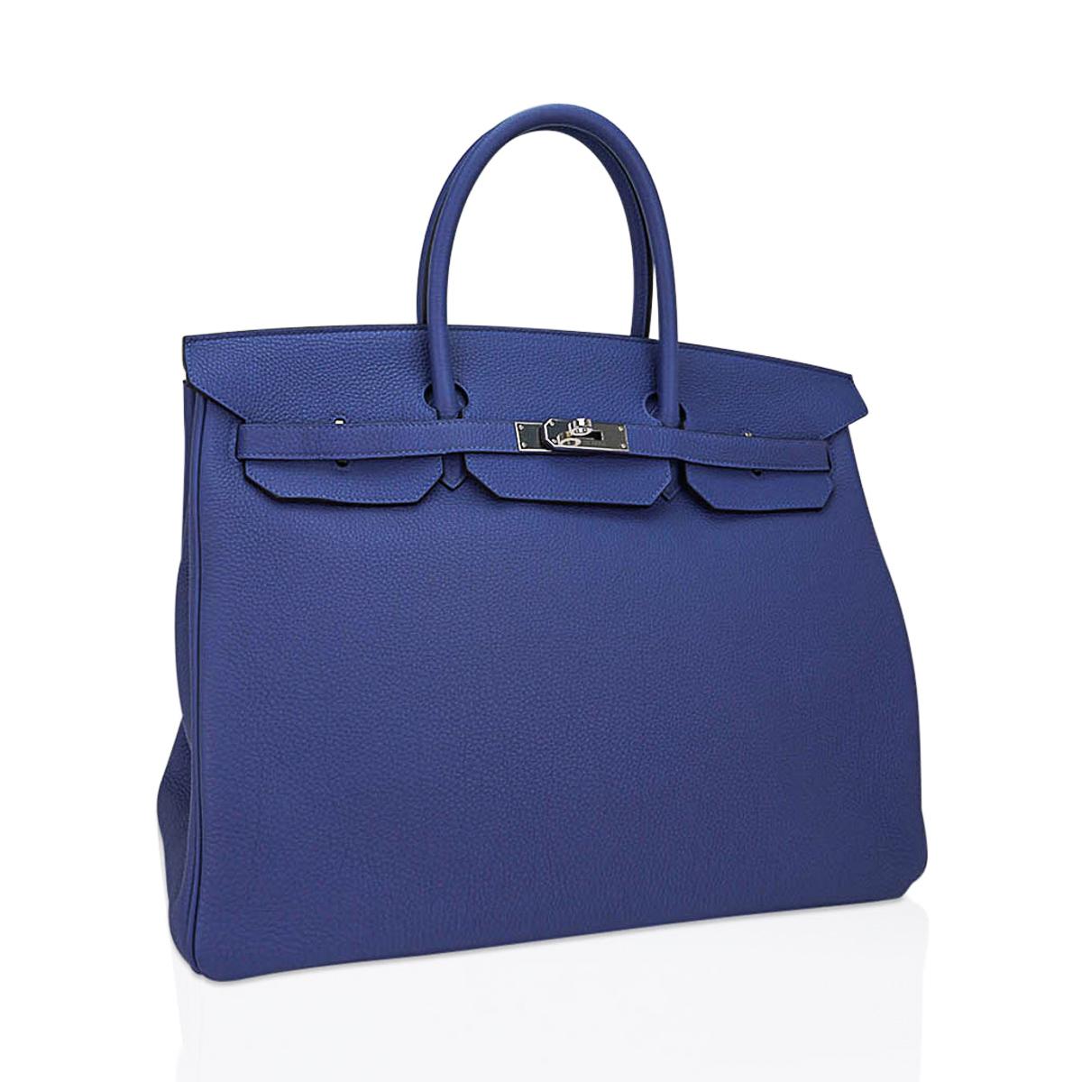 Mightychic offers a limited edition Hermes Birkin 40 bag featured in Bleu de Prusse.
Hermes leather in soft Togo is supple and scratch resistant.
Crisp with palladium hardware.
This beautiful neutral blue Birkin bag is a classic addition to any