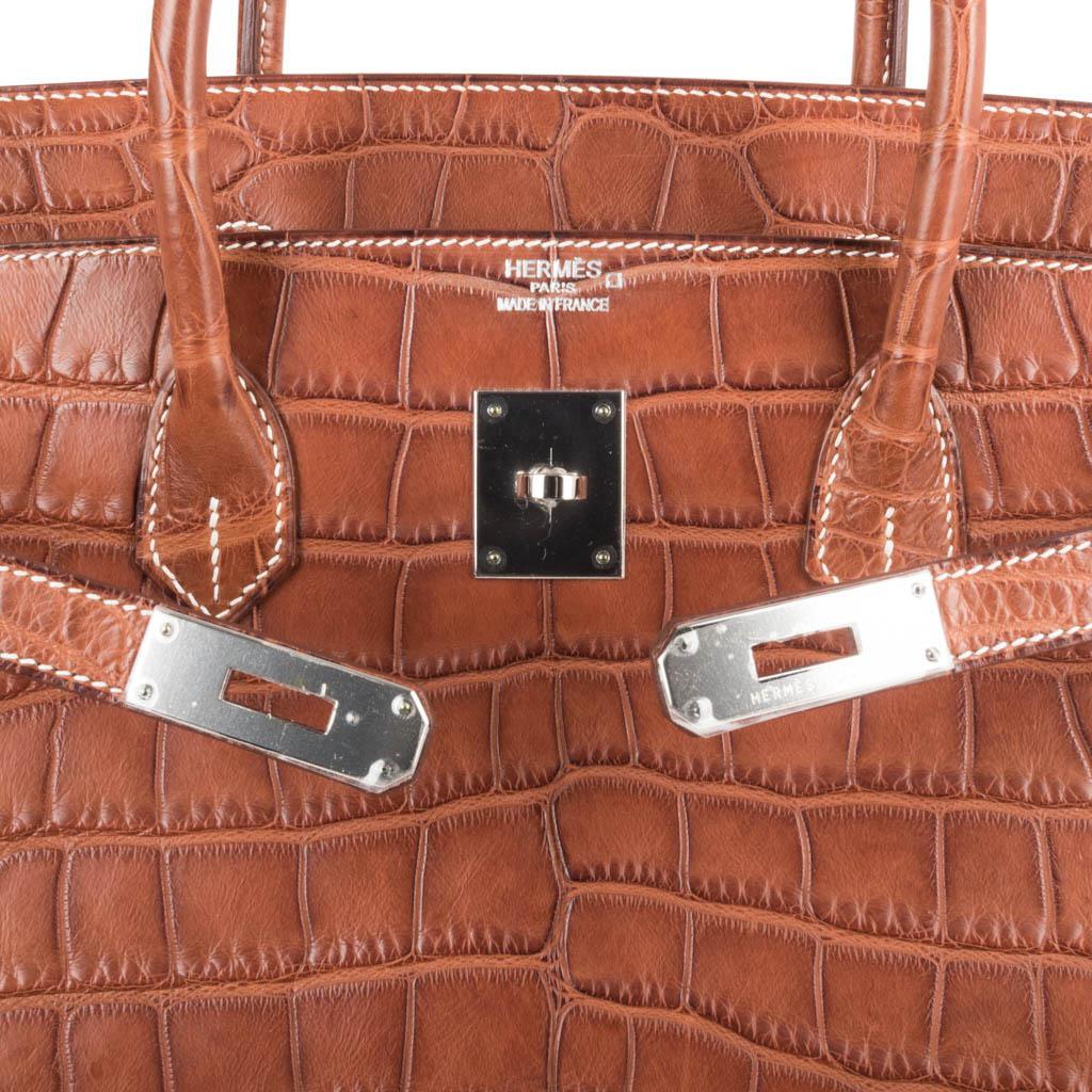 Hermes Birkin 40 rare Matte Fauve Barenia with bone top stitch detail. 
Perfect go anywhere everyday colour in the soft supple matte Alligator.  
Crisp Palladium hardware
NEW or  NEVER WORN. 
Comes with lock, keys, clochette, sleepers, raincoat and