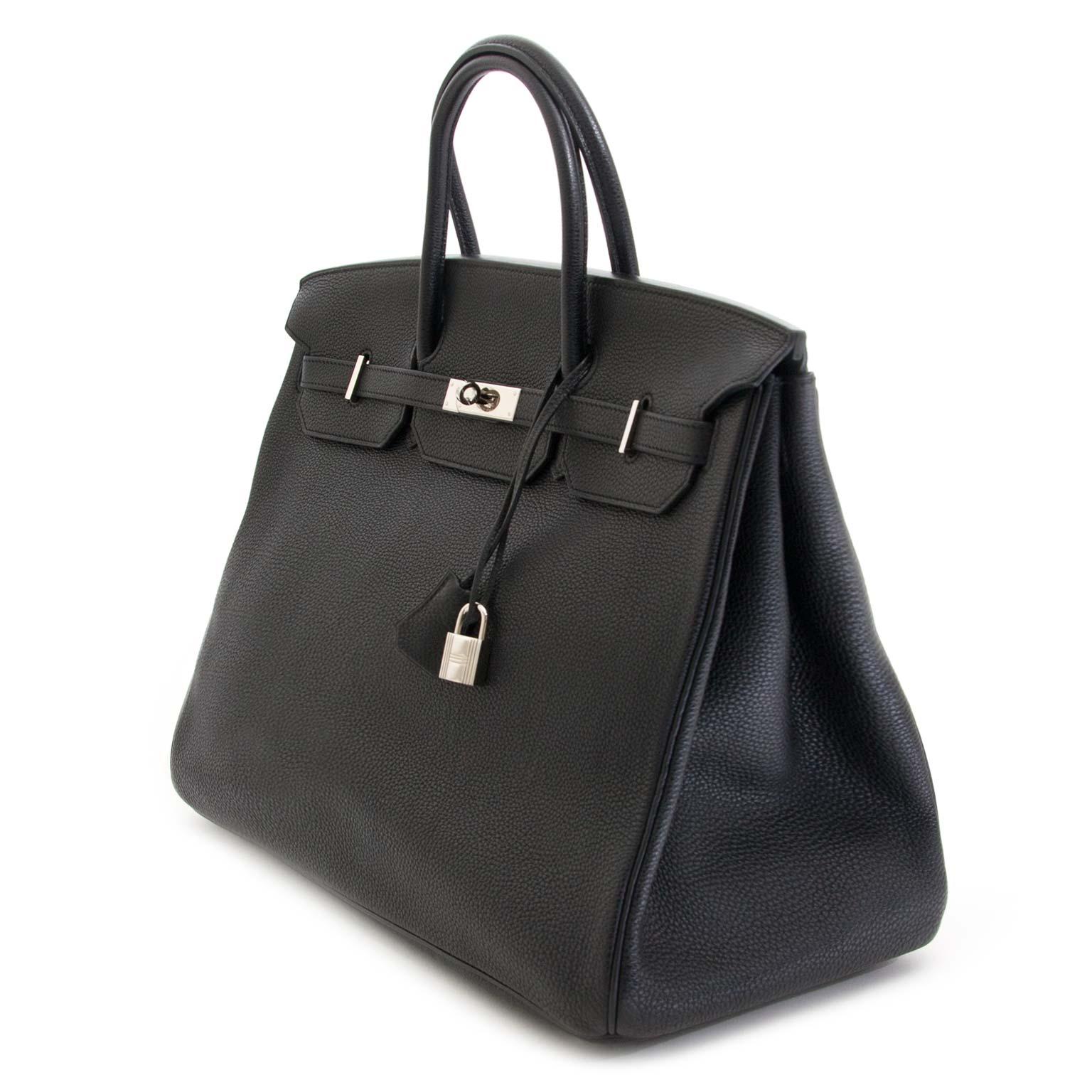 
Hermès Birkin 40 cm in beautiful and timeless black clemence taurillon leather finished with silver hardware.
The Birkin 40 will always make a statement. It 's super chic and suited for all occasions.

The beauty of Clemence leather is appreciated