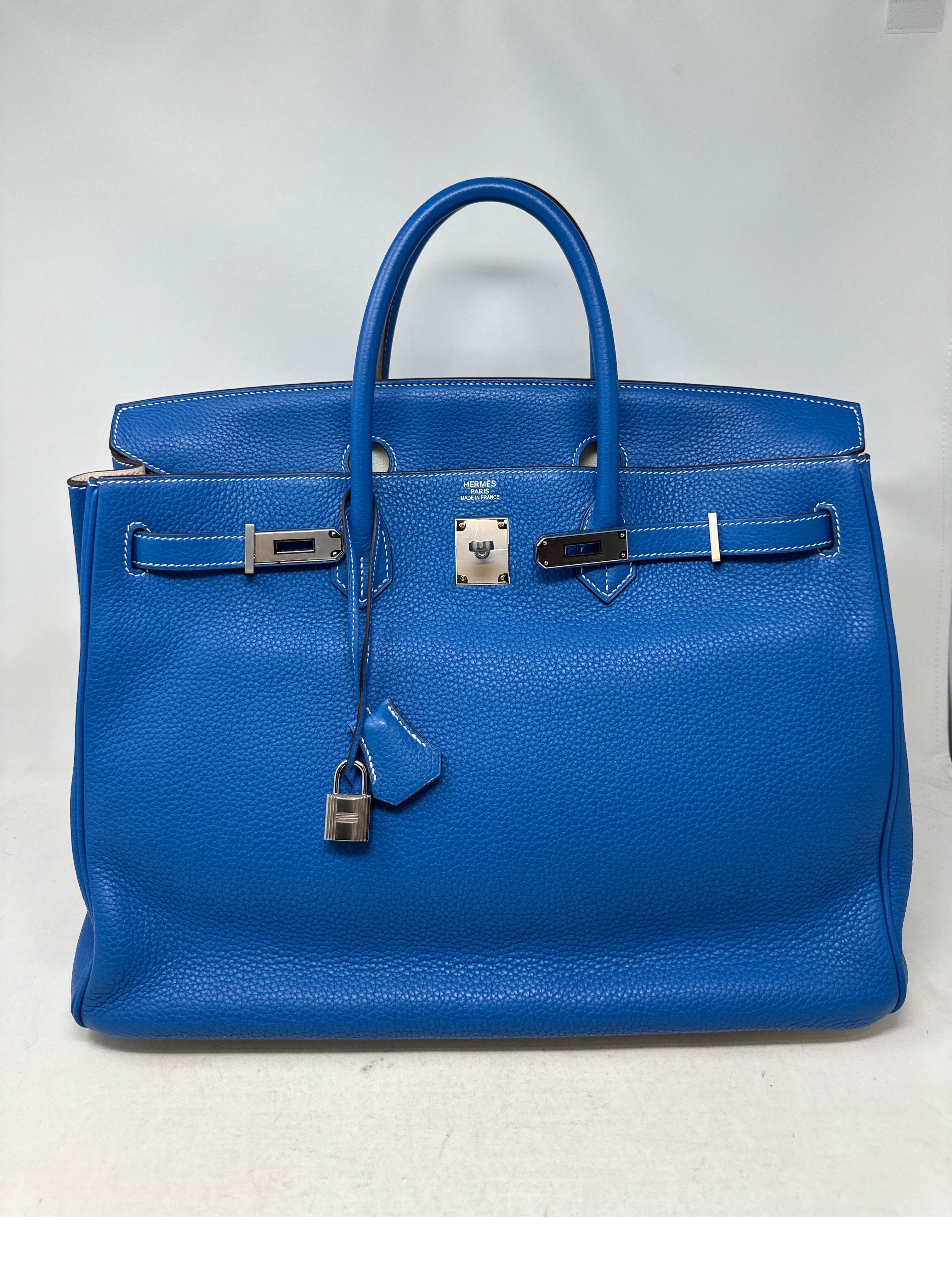 Hermes Birkin 40 Blue Mykonos Bag. Gorgeous blue exterior bag with white interior and bottom of bag. Special two-tone Birkin. Rare big 40 size Birkin. Collector's piece. Excellent condition. Plastic is still on the hardware. Includes clochette,