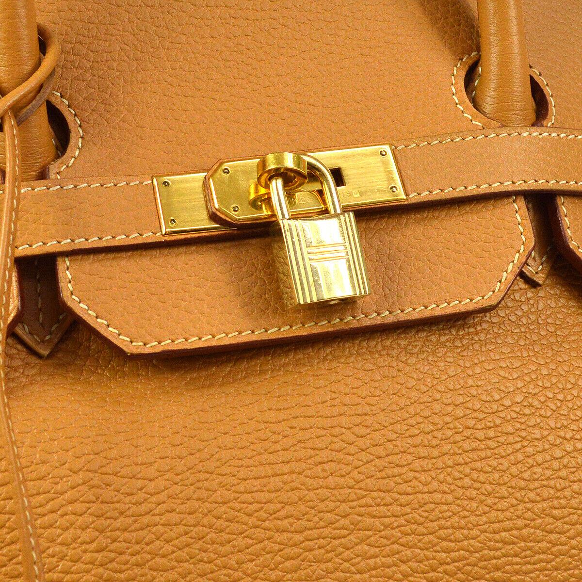 Hermes Birkin 40 Cognac Leather Gold Travel Carryall Top Handle Satchel Tote

Leather
Gold tone hardware
Leather lining
Date code present
Made in France
Handle drop 4.25