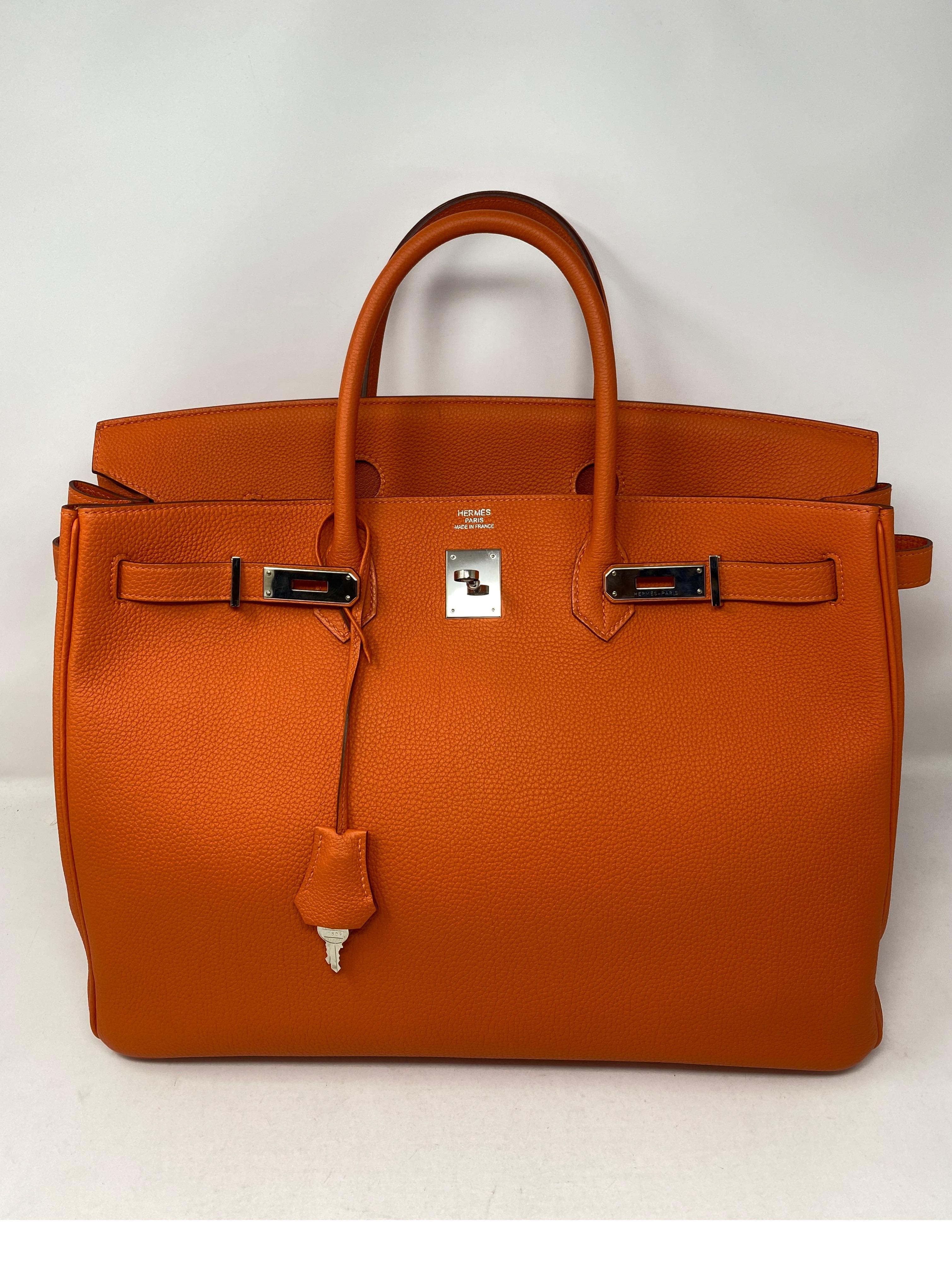 Hermes Birkin 40 Feu Orange. Togo leather. Palladium hardware. From 2015. Excellent condition. Bag looks unworn. Client kept in dust cover. Full set. Comes with original box, dust cover, clochette, lock, keys. And original receipt. Guaranteed