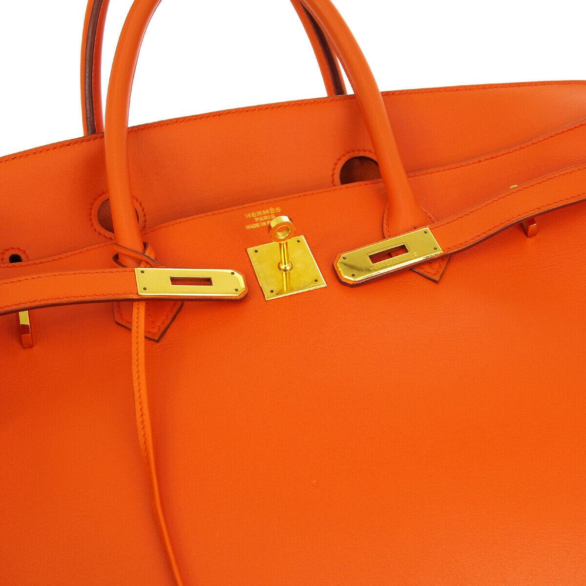 Hermes Birkin 40 Orange Leather Gold Travel Carryall Top Handle Satchel Tote

Leather
Gold tone hardware
Leather lining
Date code present
Made in France
Handle drop 4.25