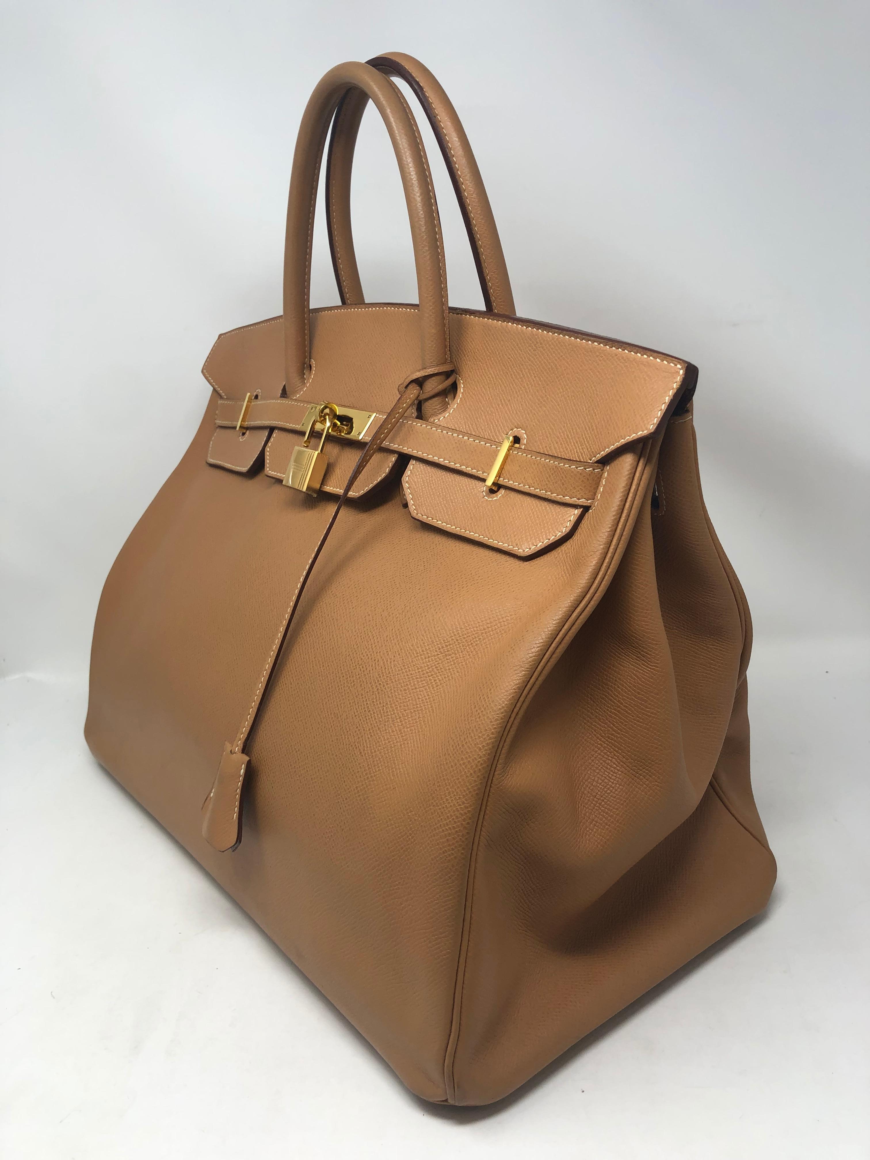 Hermes Birkin Tan Color with gold hardware. Rare size 40. Vintage Birkin in light gold tan color. Good condition. Light scuffs on corner. Beautiful leather and interior clean. No longer produced size 40. Can be a great luggage companion or every day
