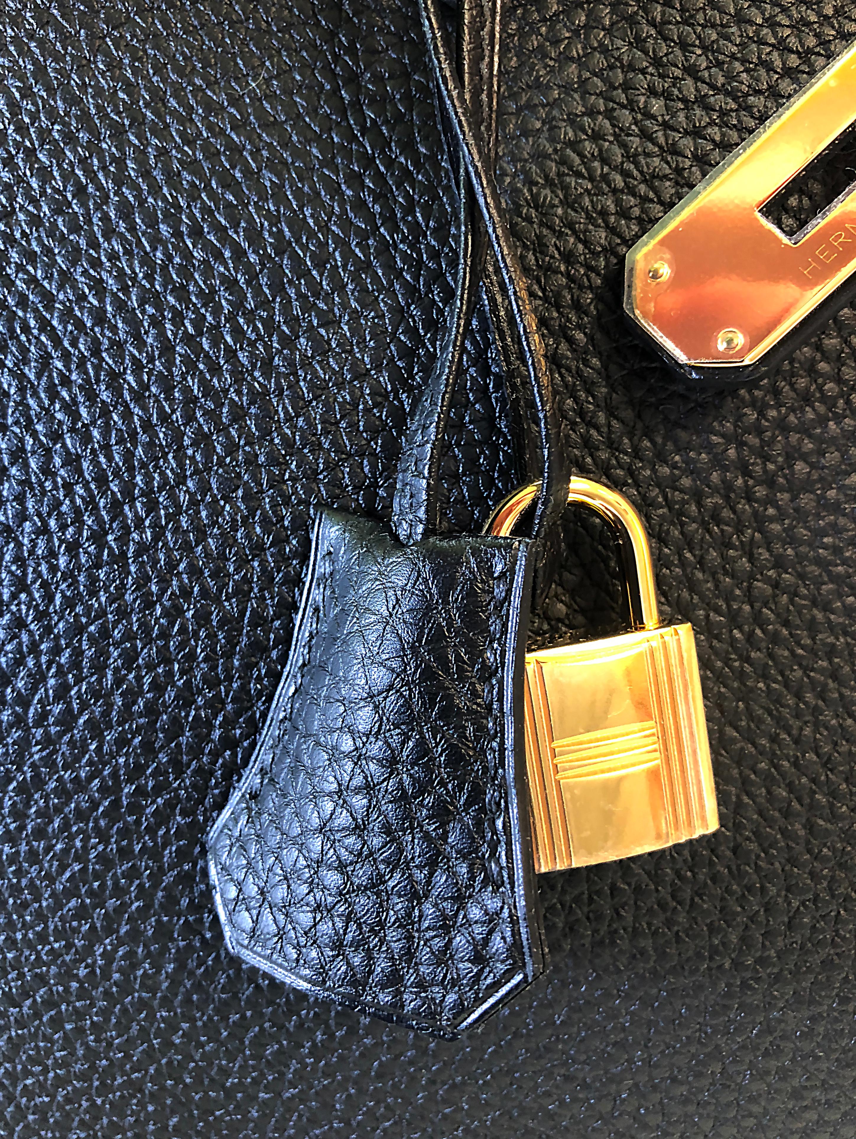 A classic Hermes Birkin 40cm bag finished in Togo black leather with gold hardware.
Presented in the signature Hermes orange box with lock and keys, comes with clochette, sleepers and raincoat. Date stamped O for 2013.
New or in unused condition